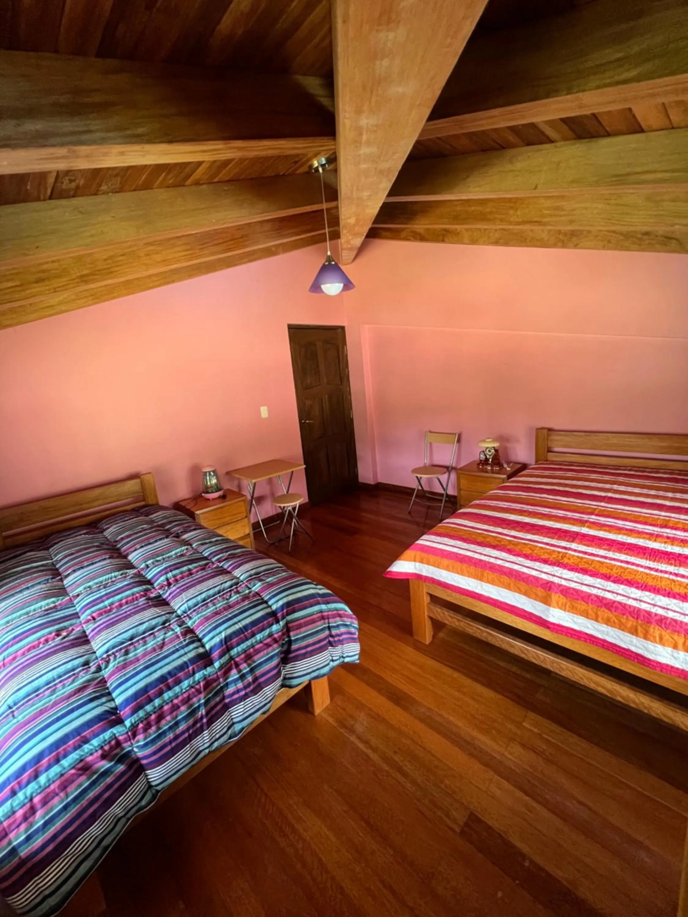 Bed in Lodge Acopampa Inn
