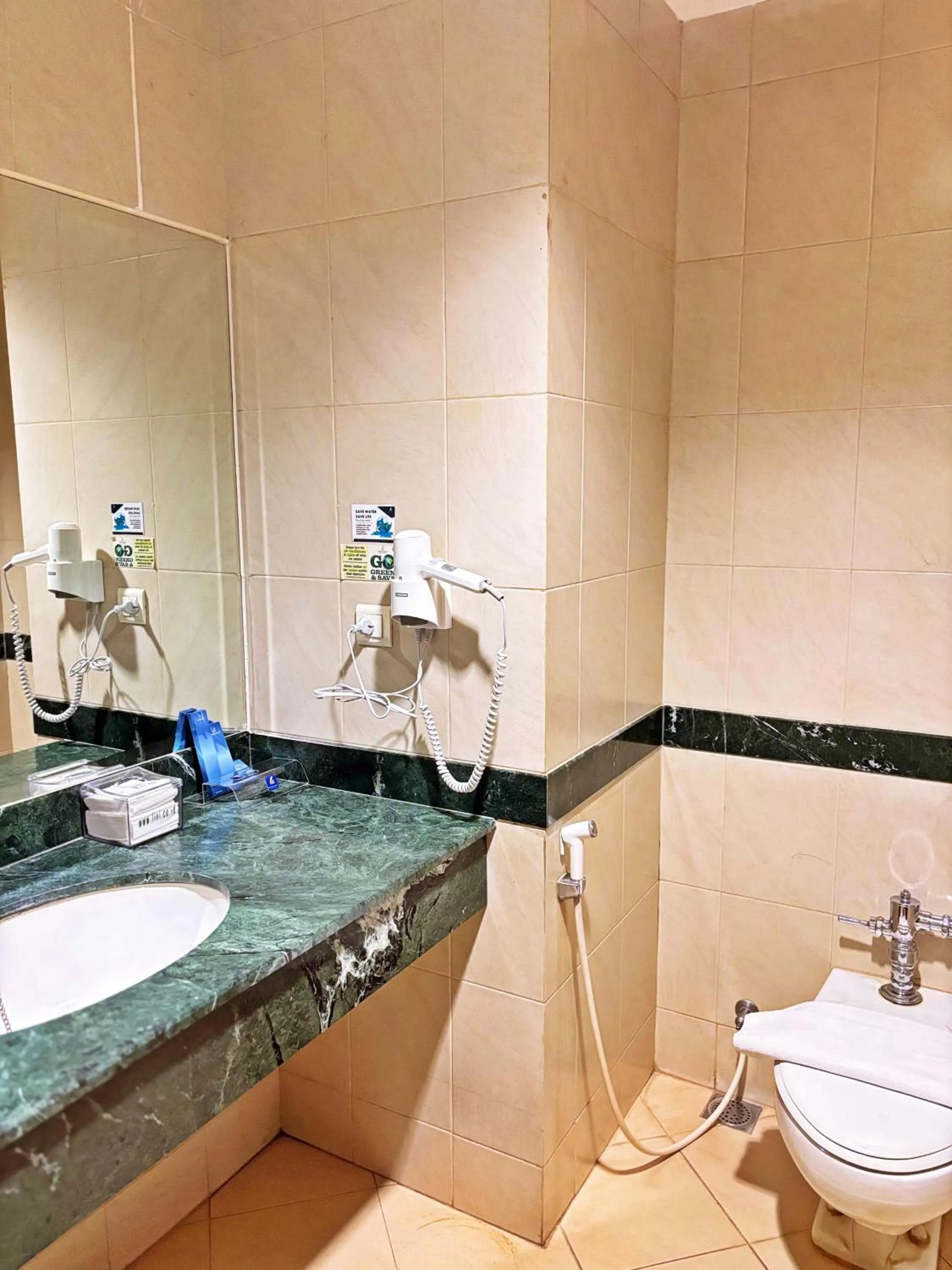 Bathroom in Grand Elite Hotel Pekanbaru