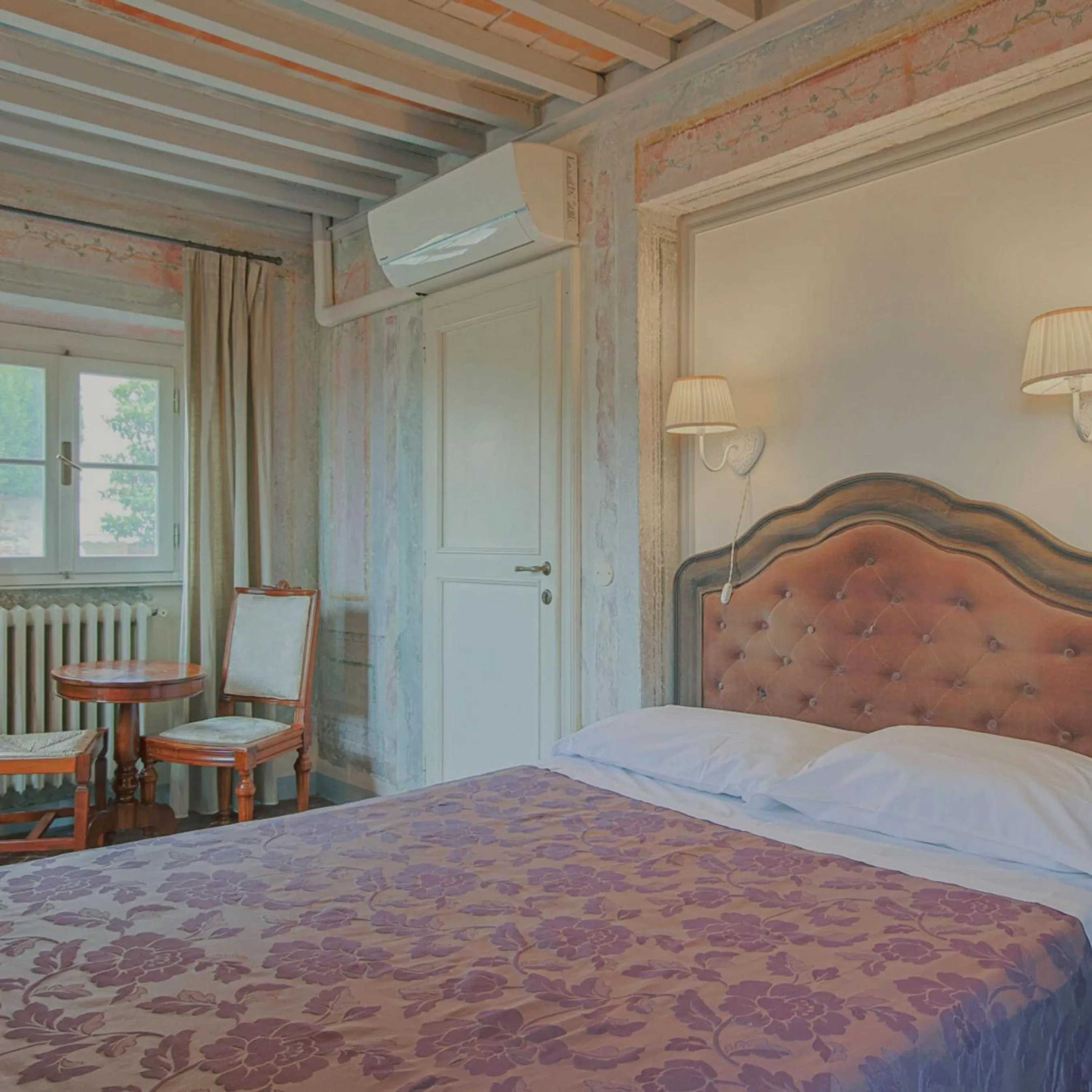 Bed in Hotel Villa Sermolli