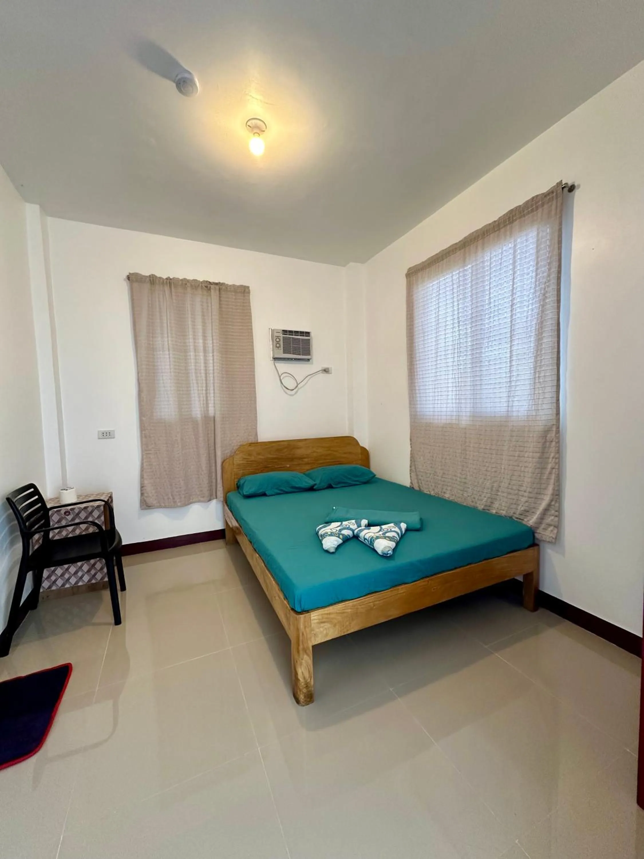 Bed in Marz inn Moalboal