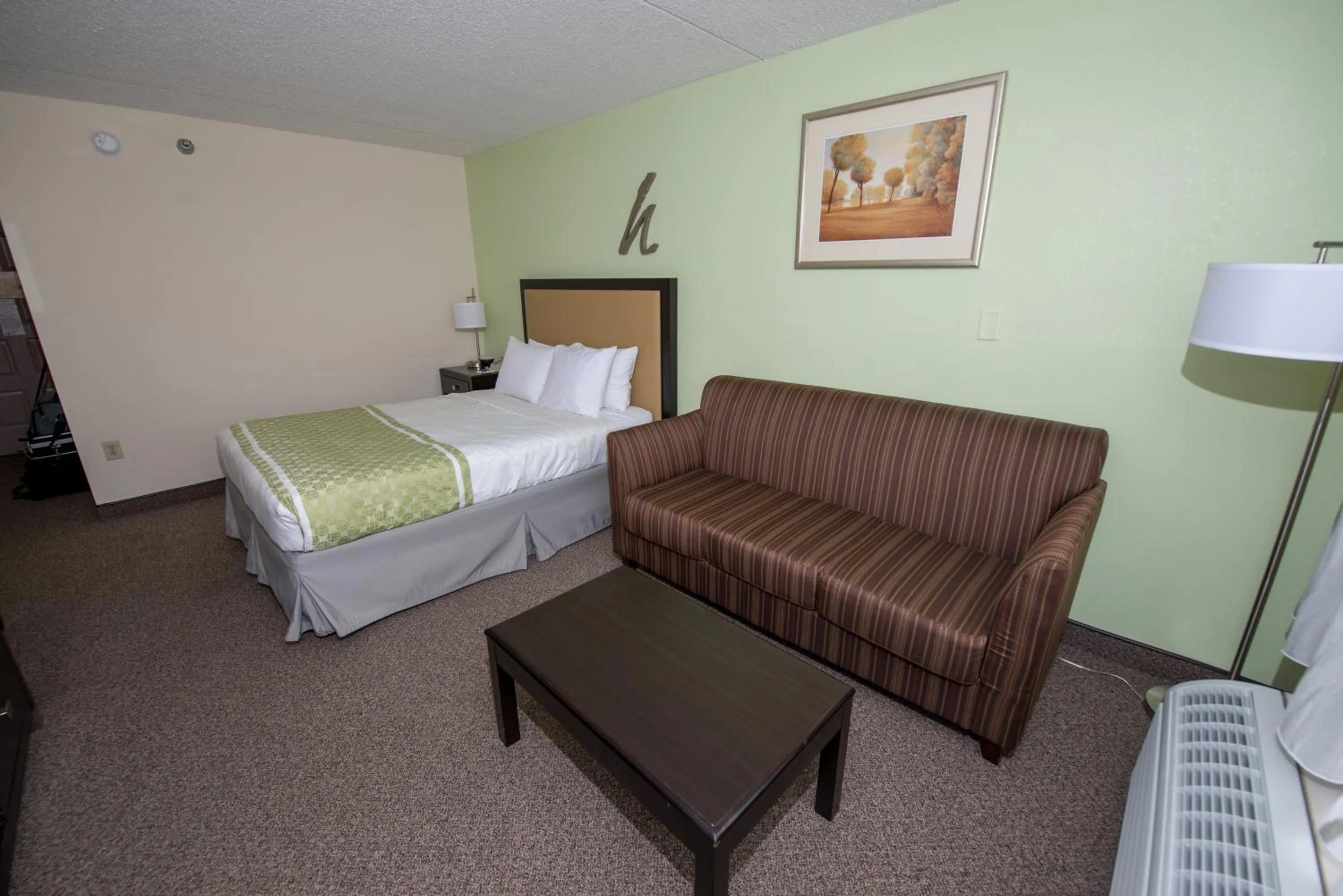 Bed in Hope Hotel and Richard C. Holbrooke Conference Center