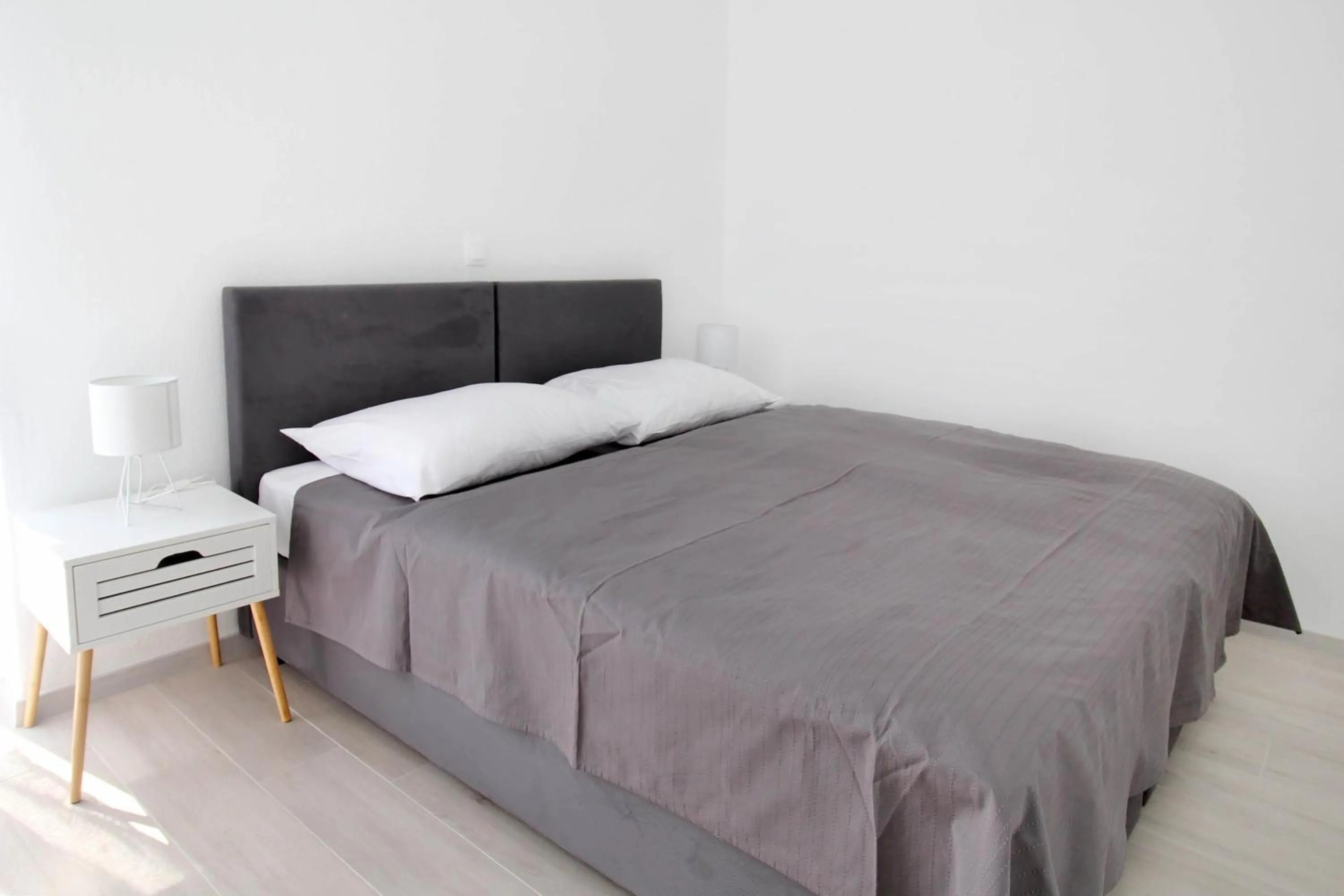 Bed in Bacan Family Apartments