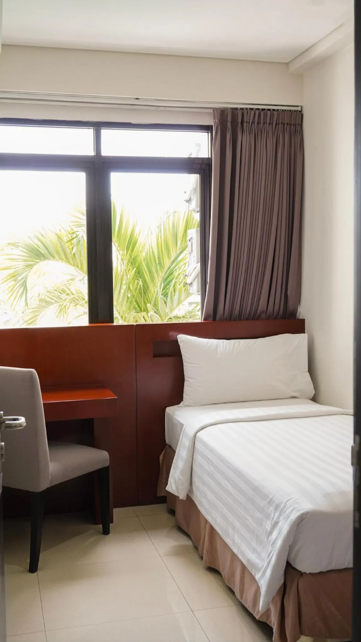 Property building, Bed in Grand Kuta Hotel and Residence