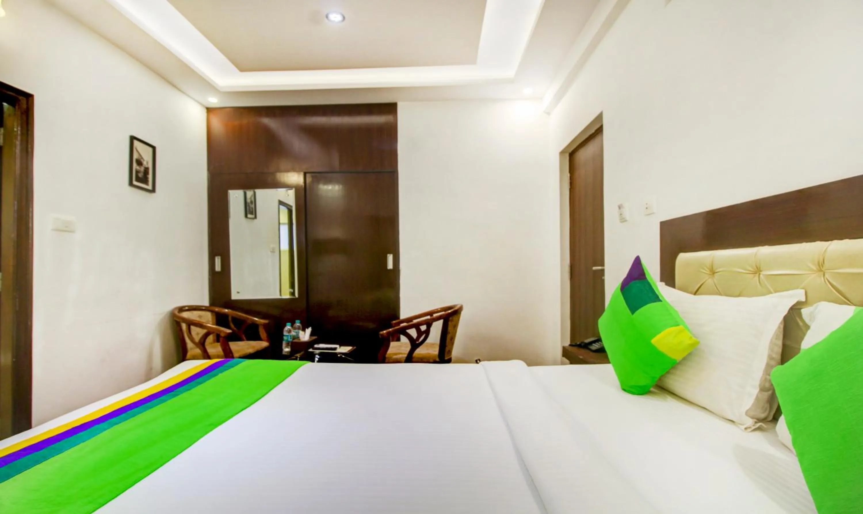 Bedroom, Bed in Treebo The Sai Leela Suites