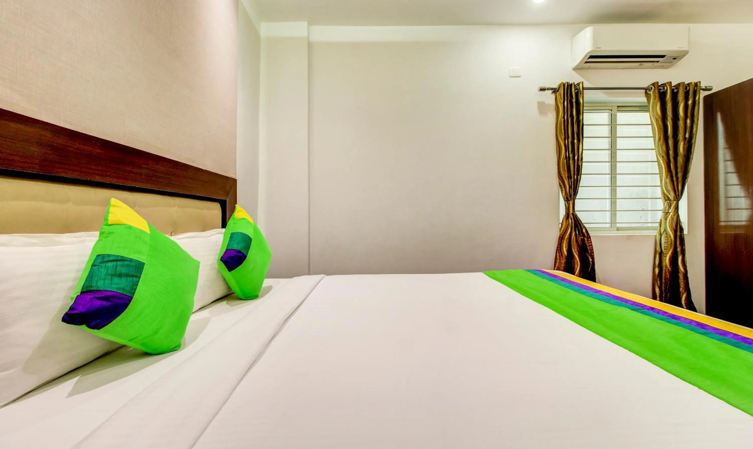 Bedroom, Bed in Treebo The Sai Leela Suites