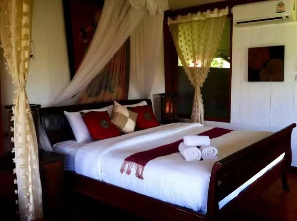 Bed in Vimarnkiri Resort