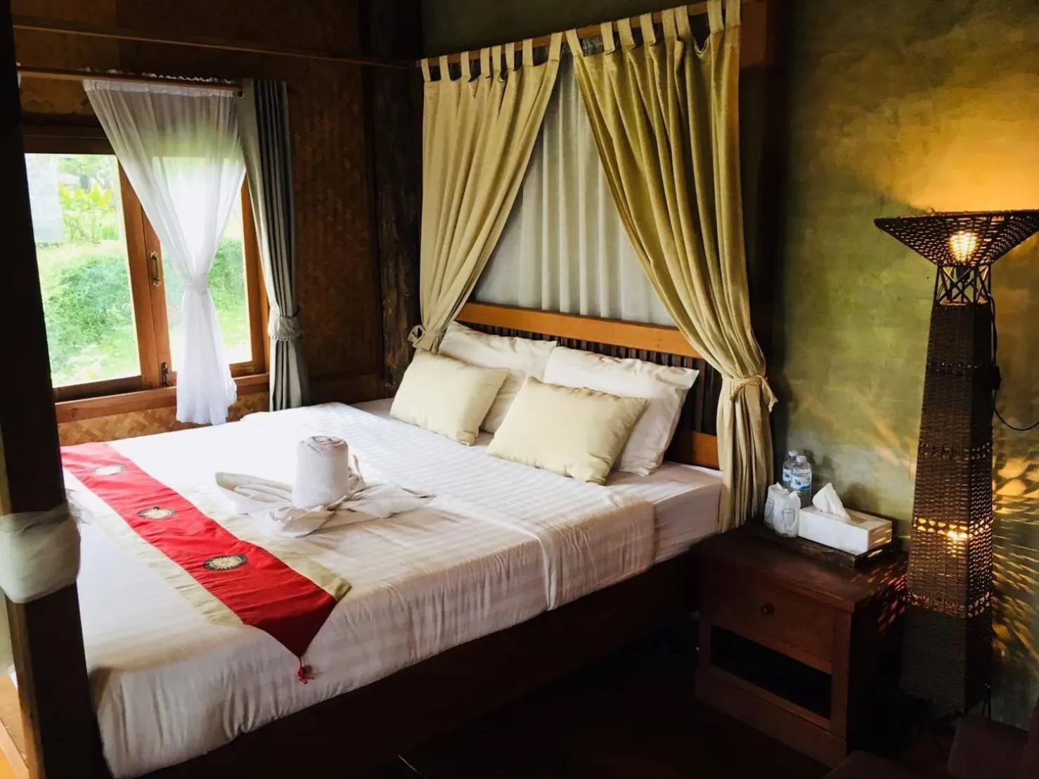 Bed in Vimarnkiri Resort