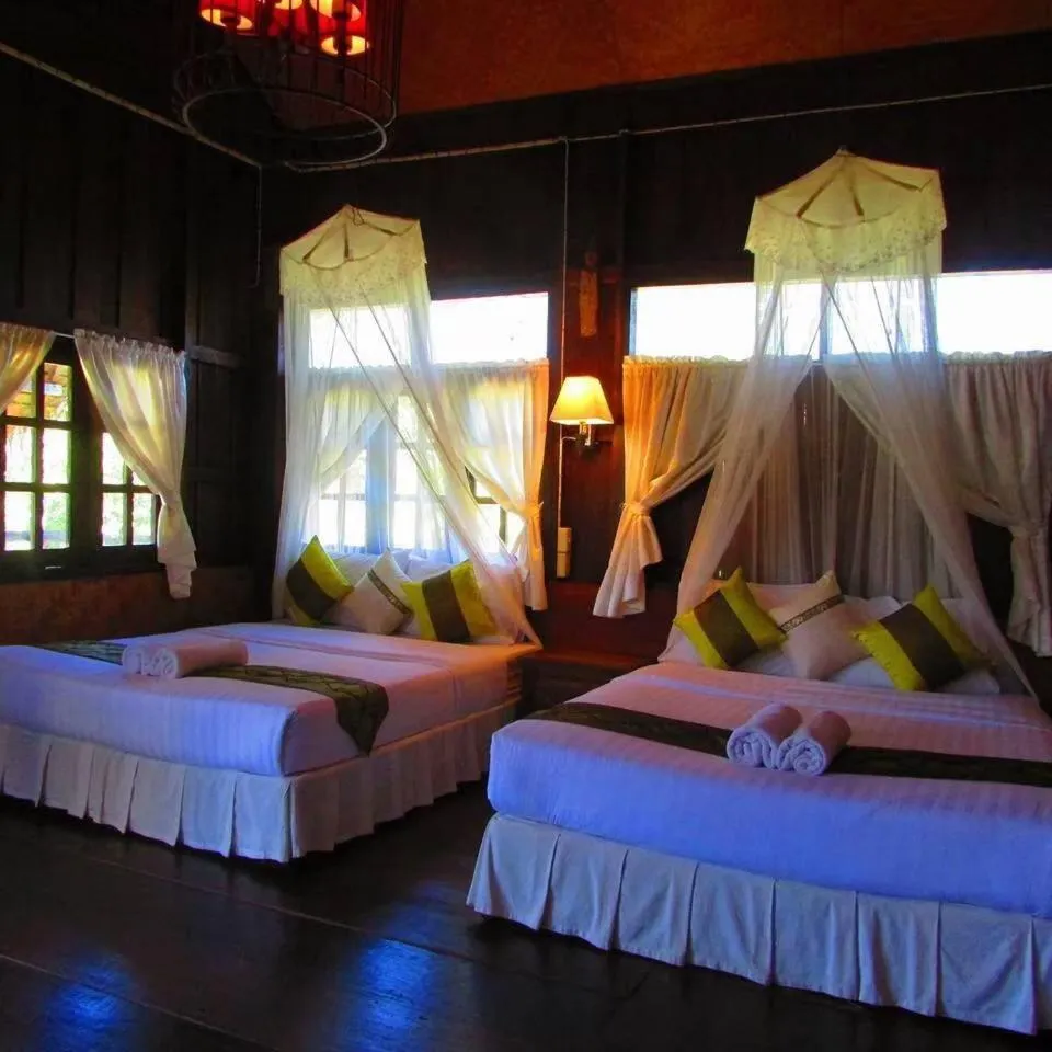 Bed in Vimarnkiri Resort