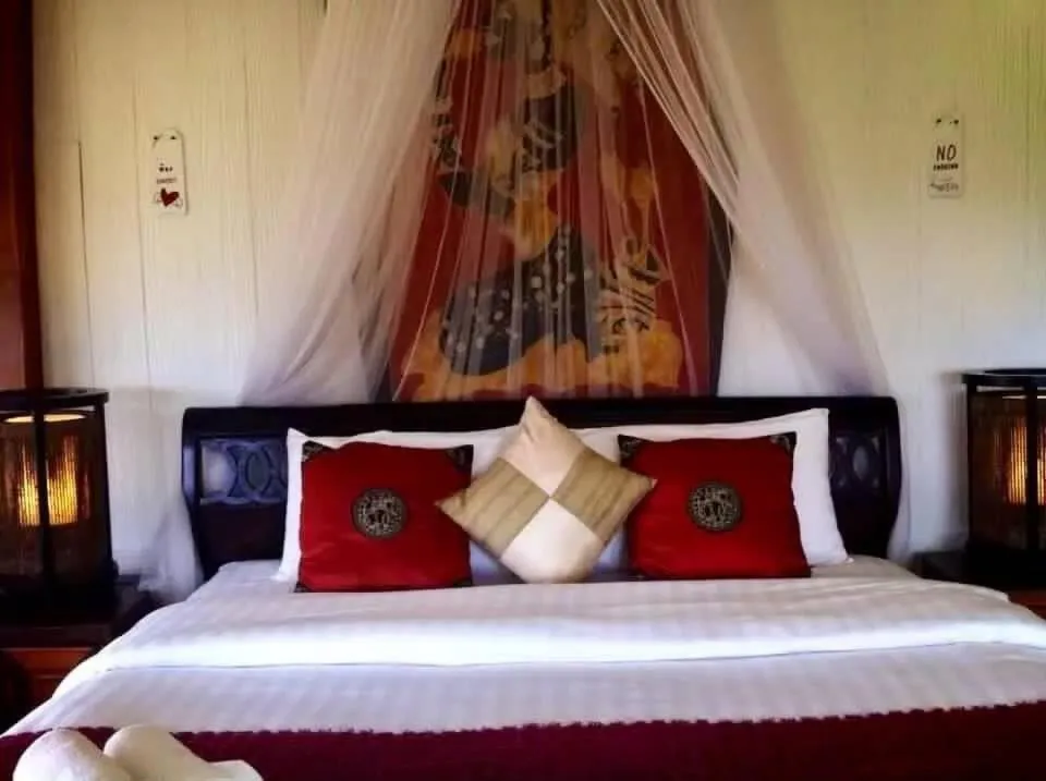 Bed in Vimarnkiri Resort