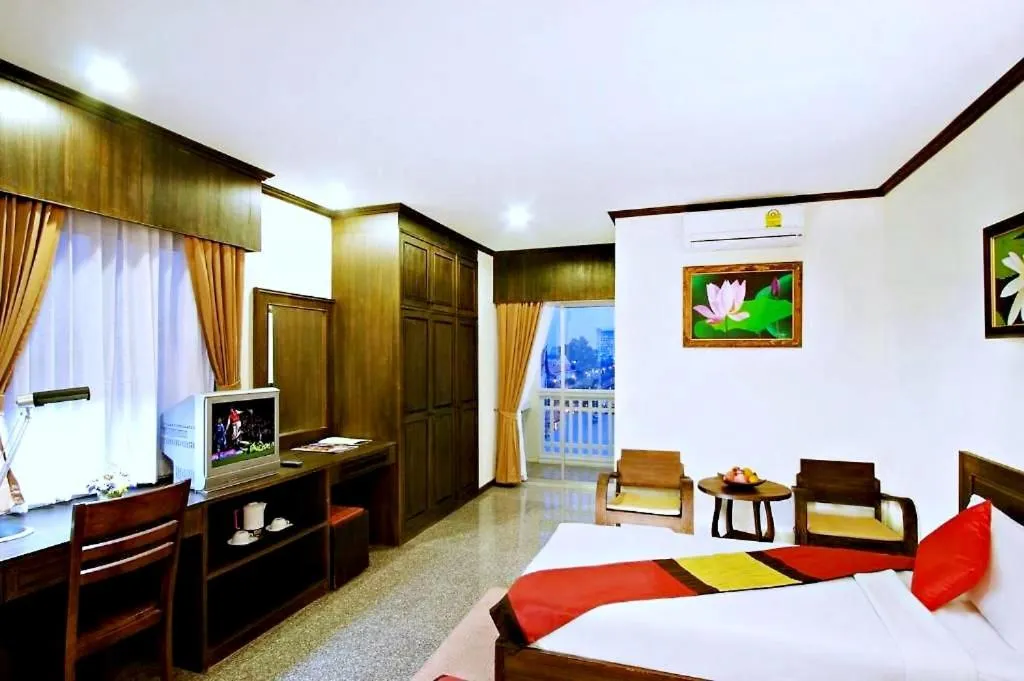 Bed in Royal Panerai Hotel Chiangmai