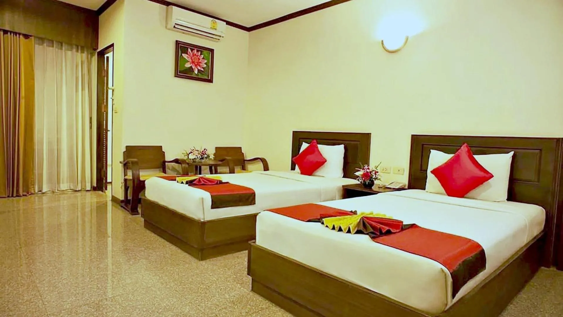 Bed in Royal Panerai Hotel Chiangmai