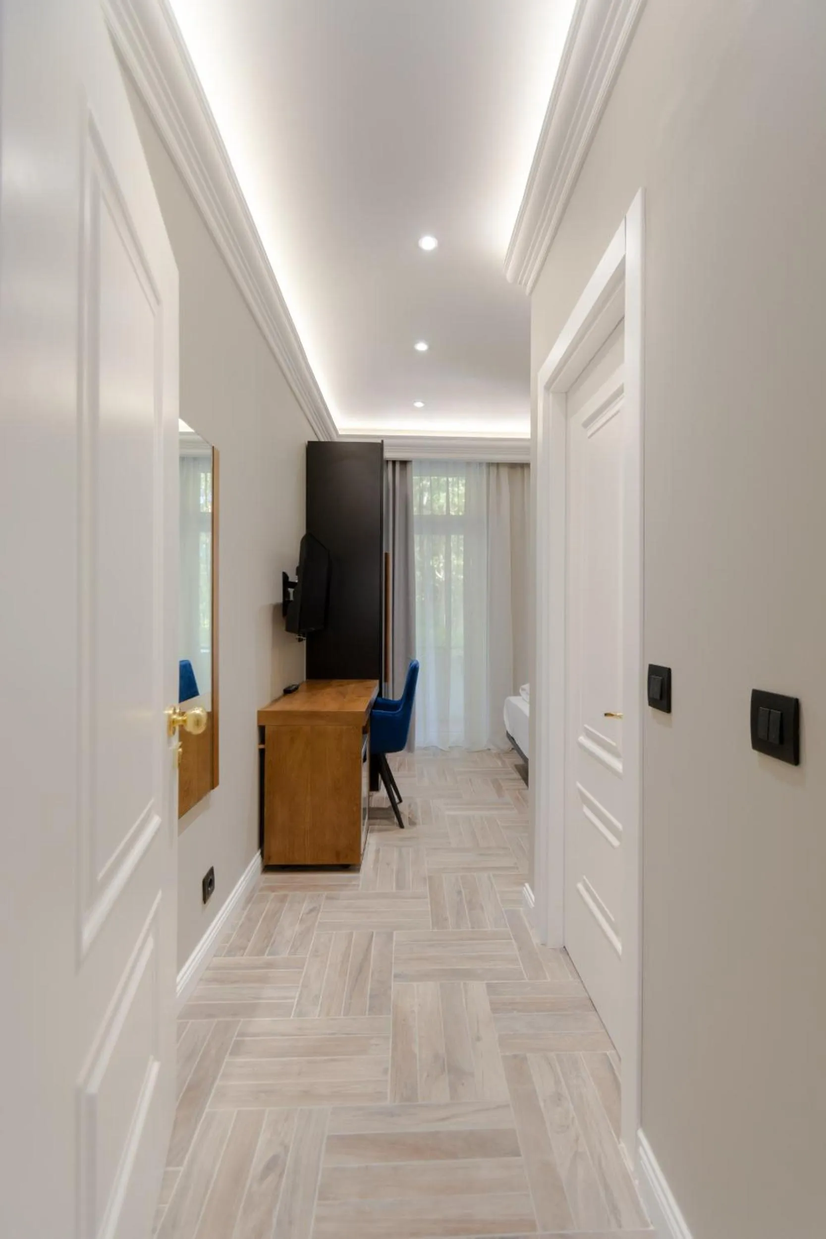 Communal lounge/ TV room in 2H Horizon Hotel