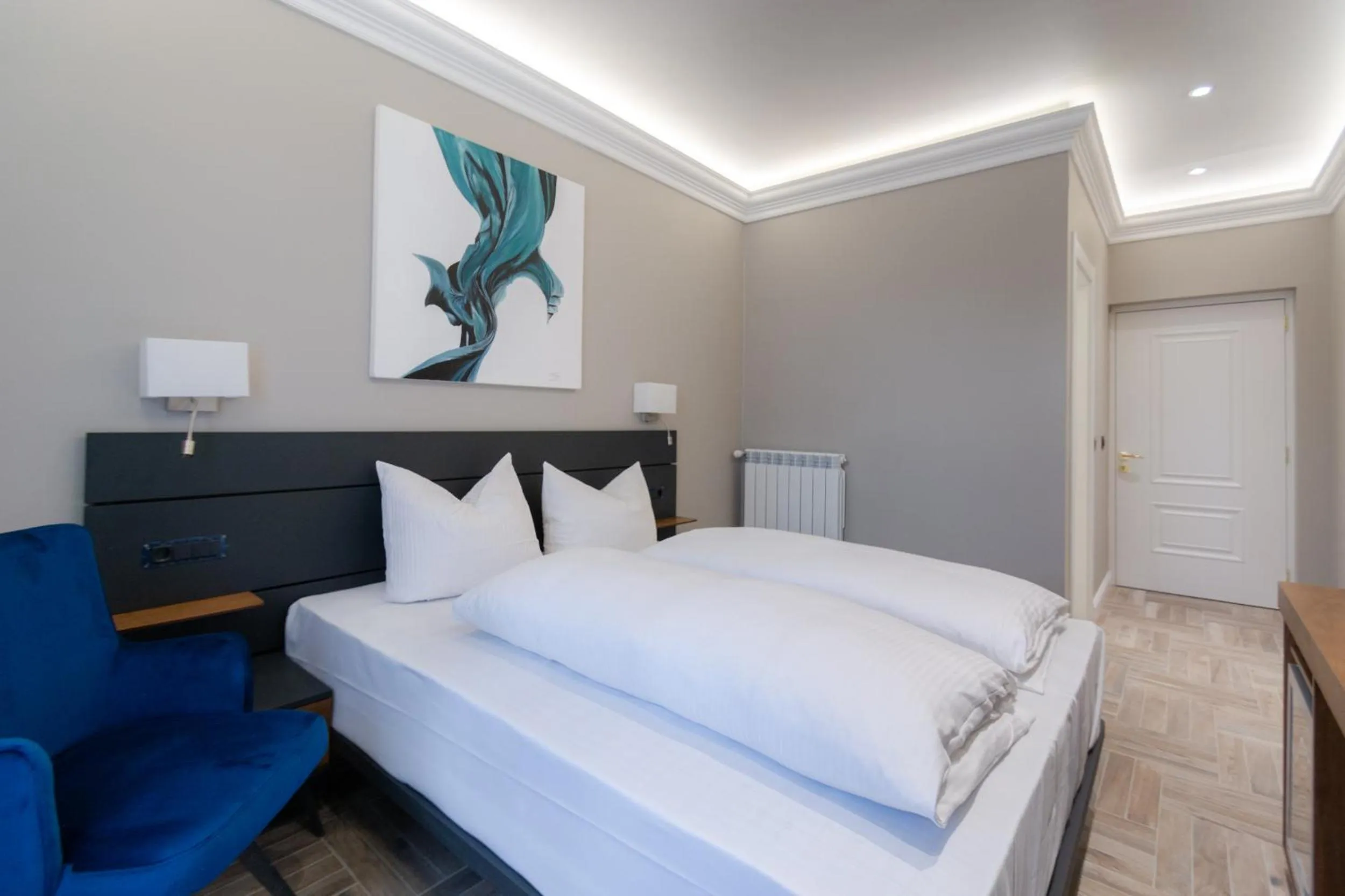 Bed in 2H Horizon Hotel