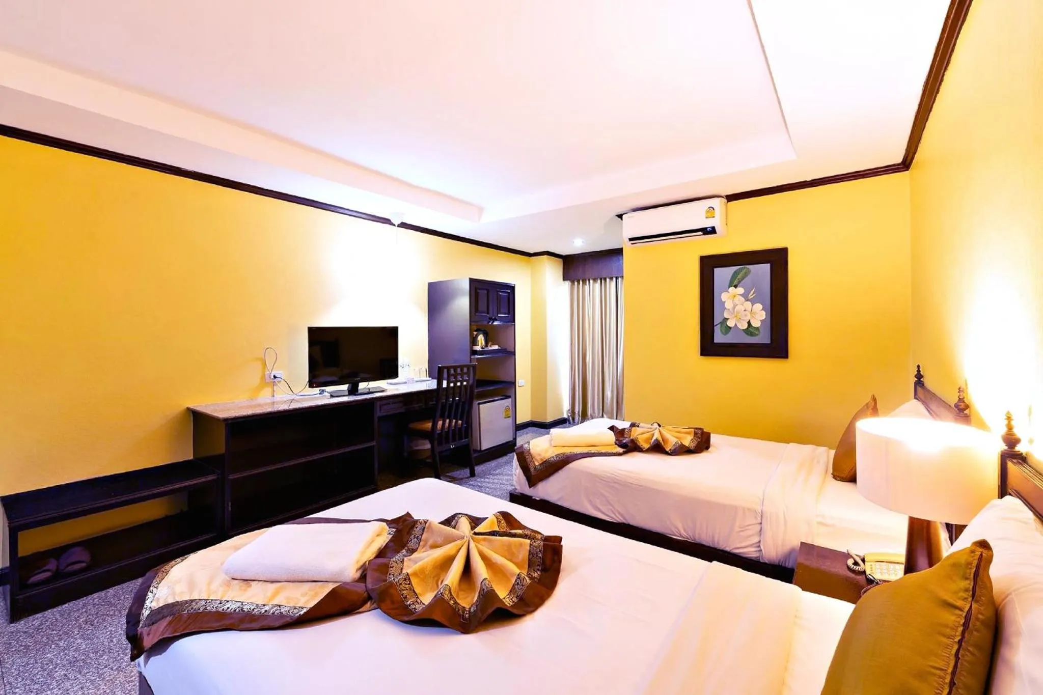 Bed in Royal Peninsula Hotel Chiangmai