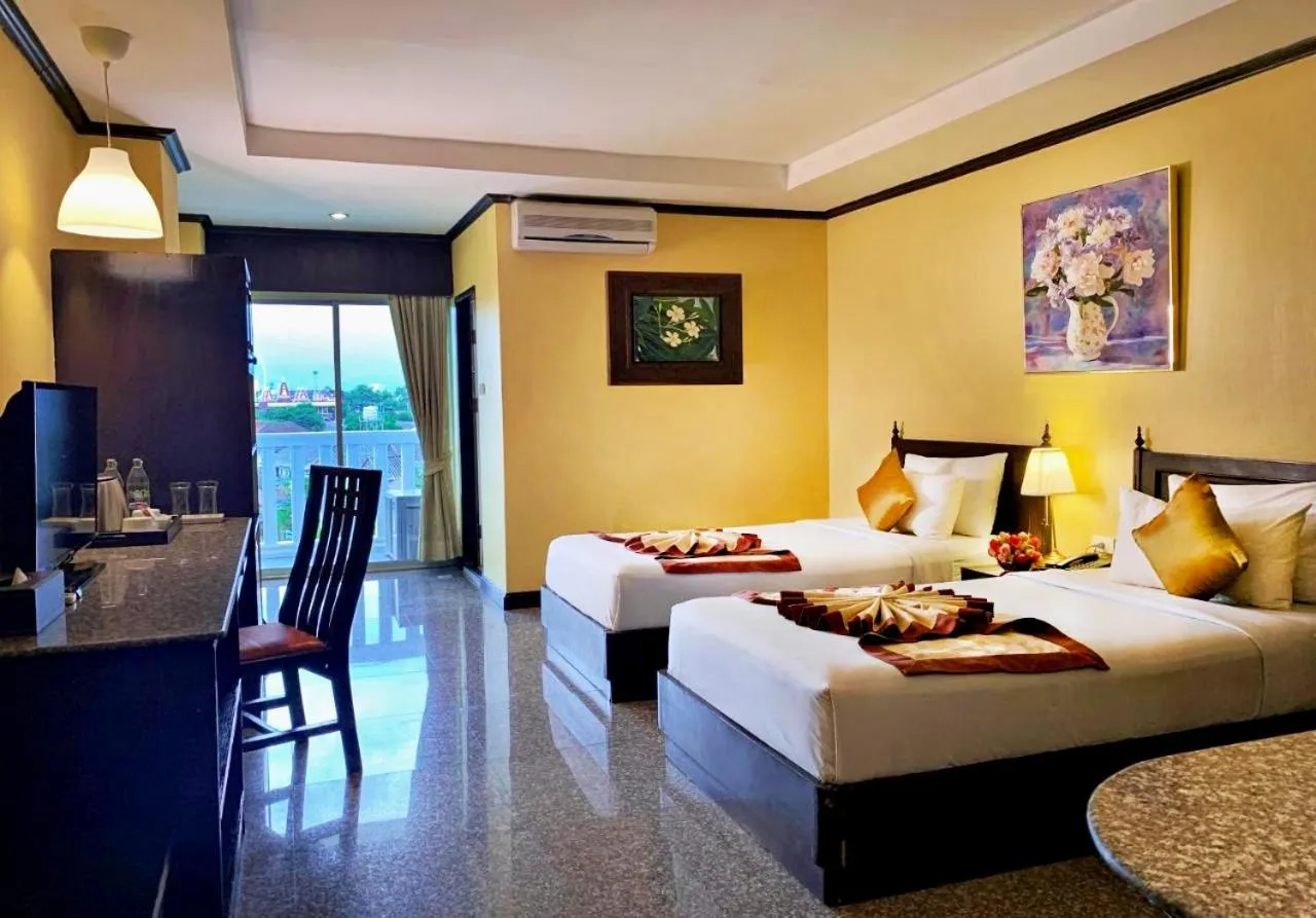 Bed in Royal Peninsula Hotel Chiangmai