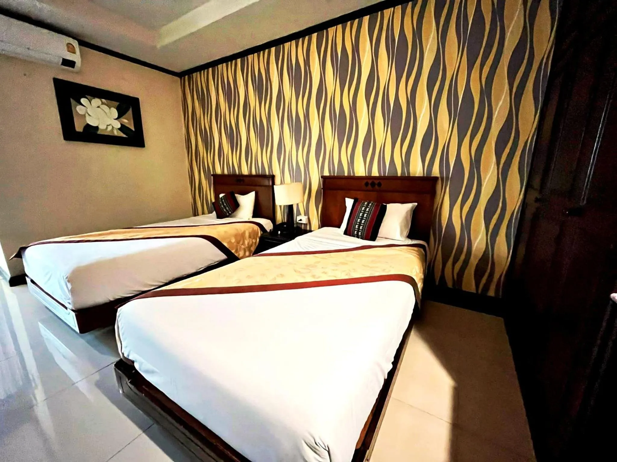 Bed in Royal Peninsula Hotel Chiangmai