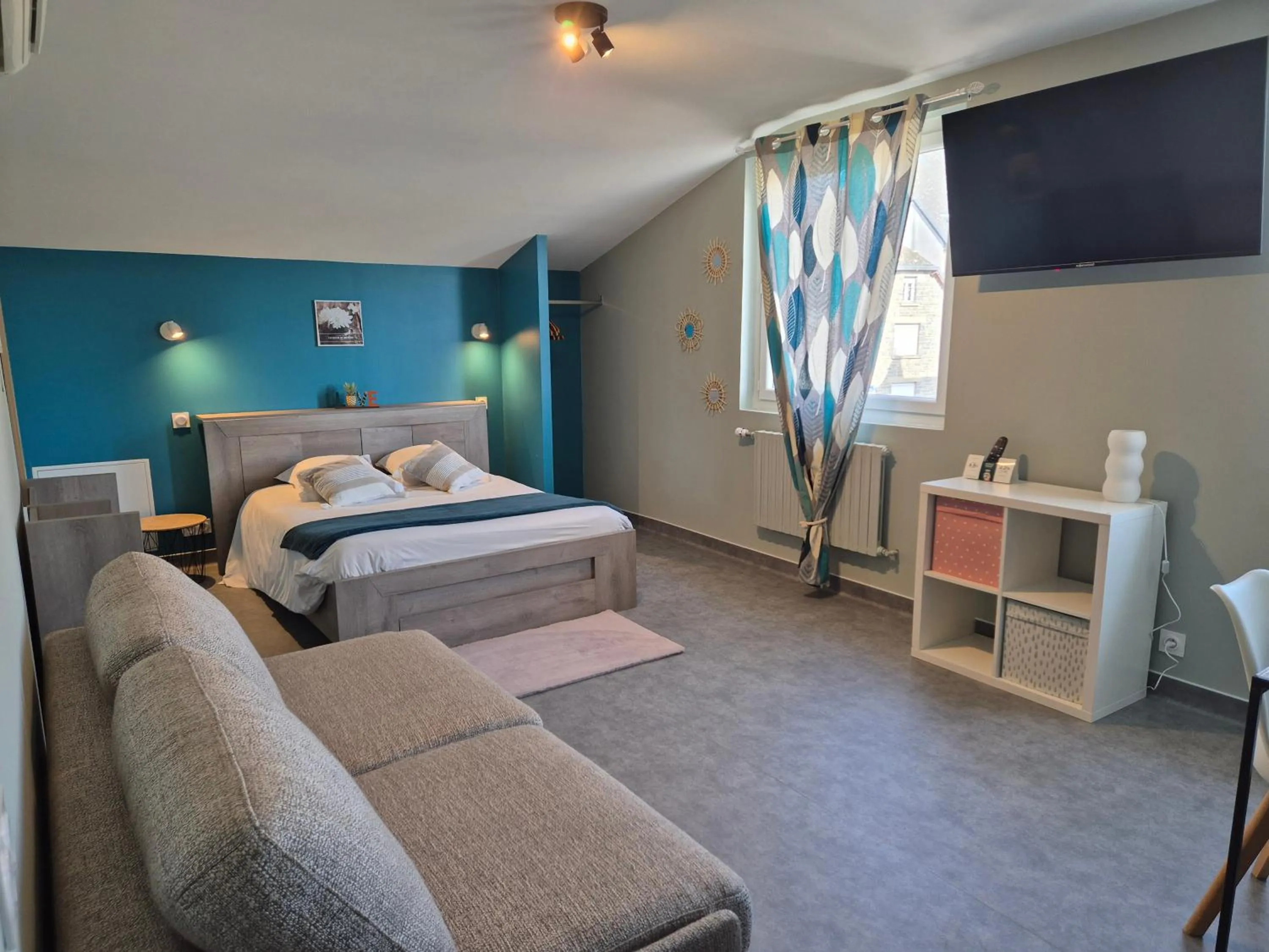 Bed in Logis Hôtel Restaurant L'Oustal