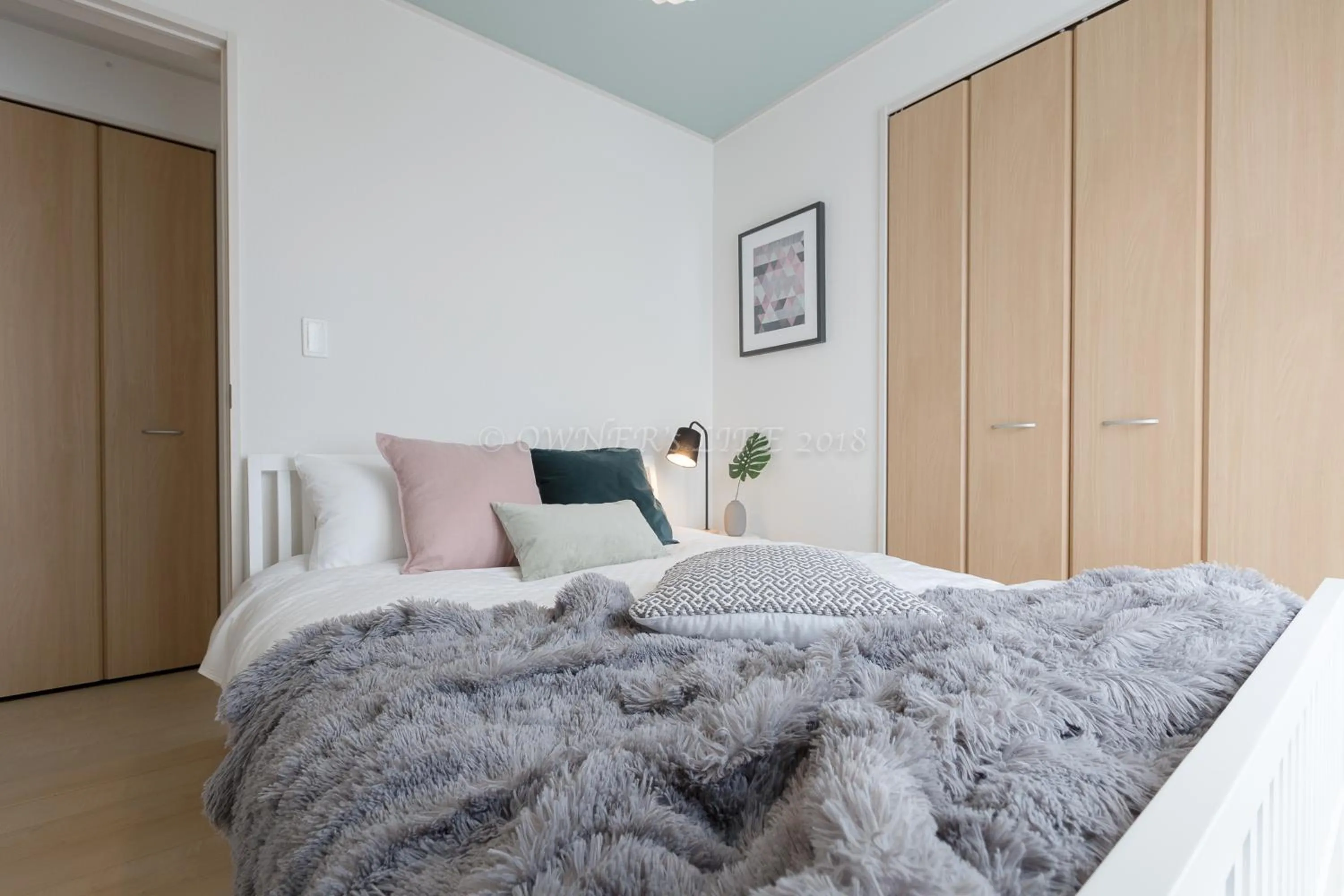 Bed in Condominium Mahalo