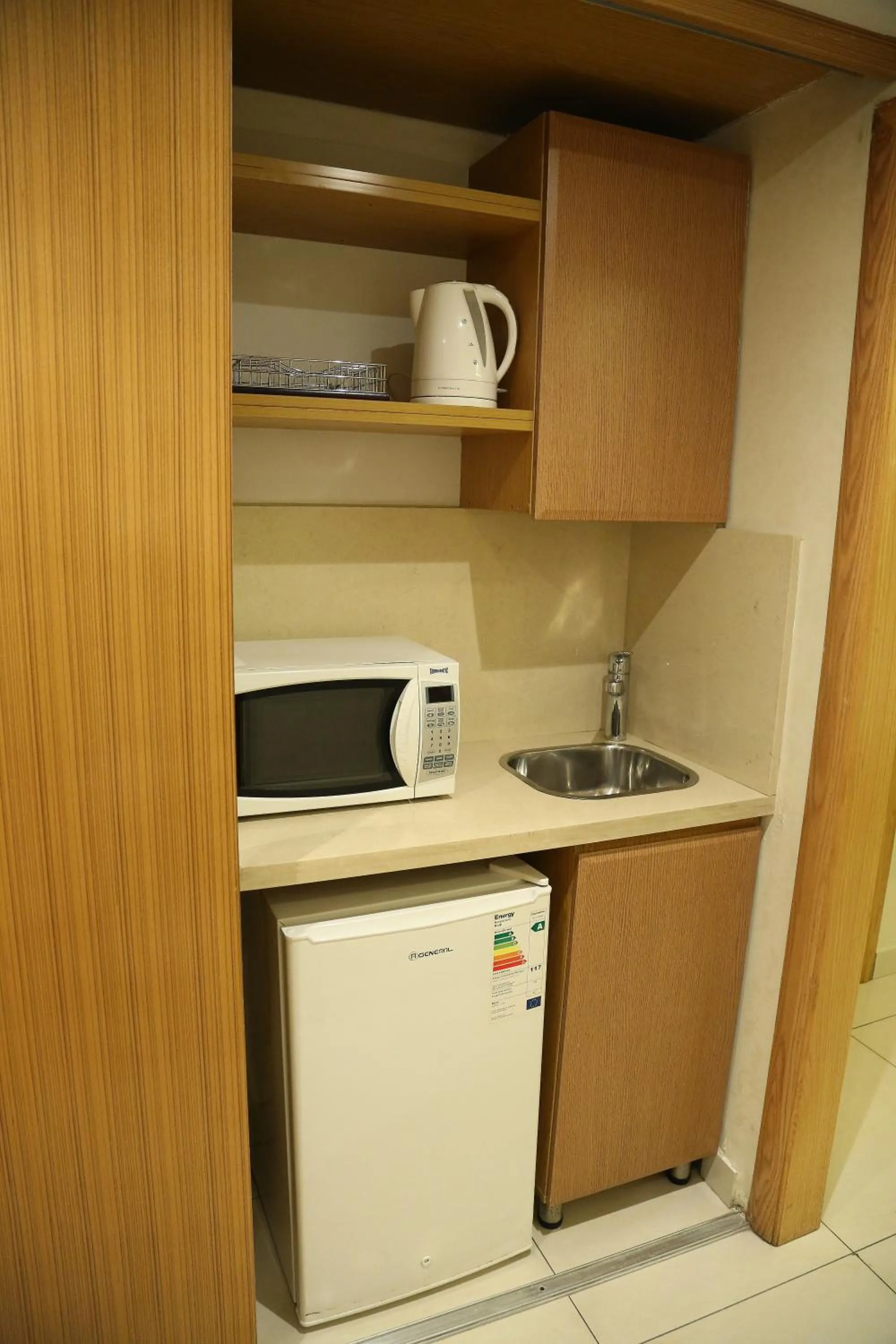 Kitchen or kitchenette in Verdun Suites Hotel