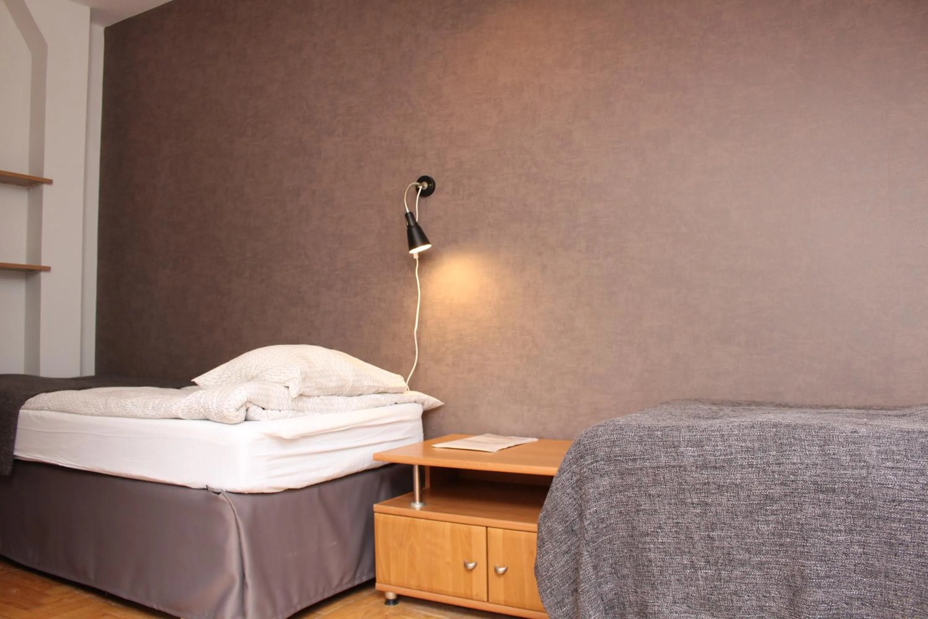 Bed in Cracow Old Town Guest House