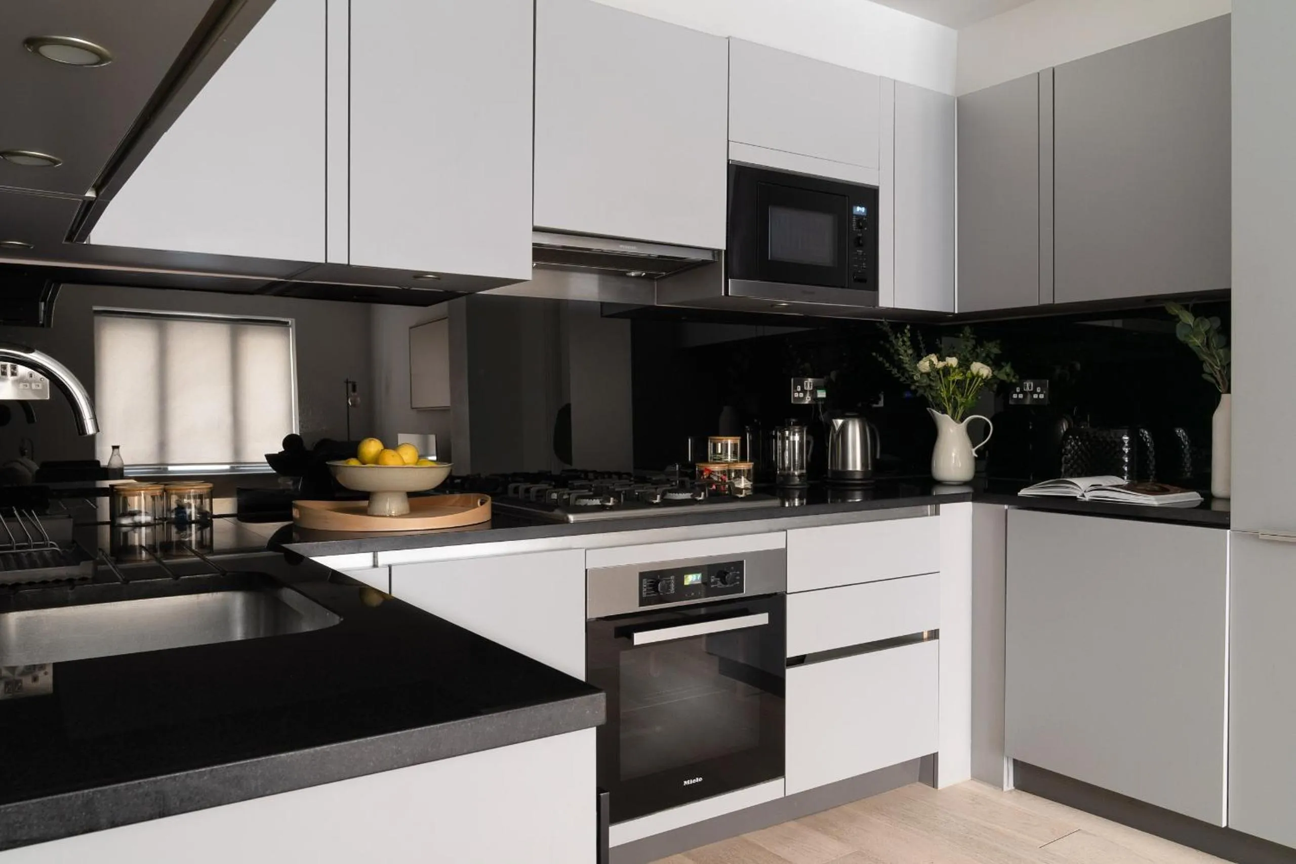 Kitchen or kitchenette in Oxford Circus Apartments by Calton Living