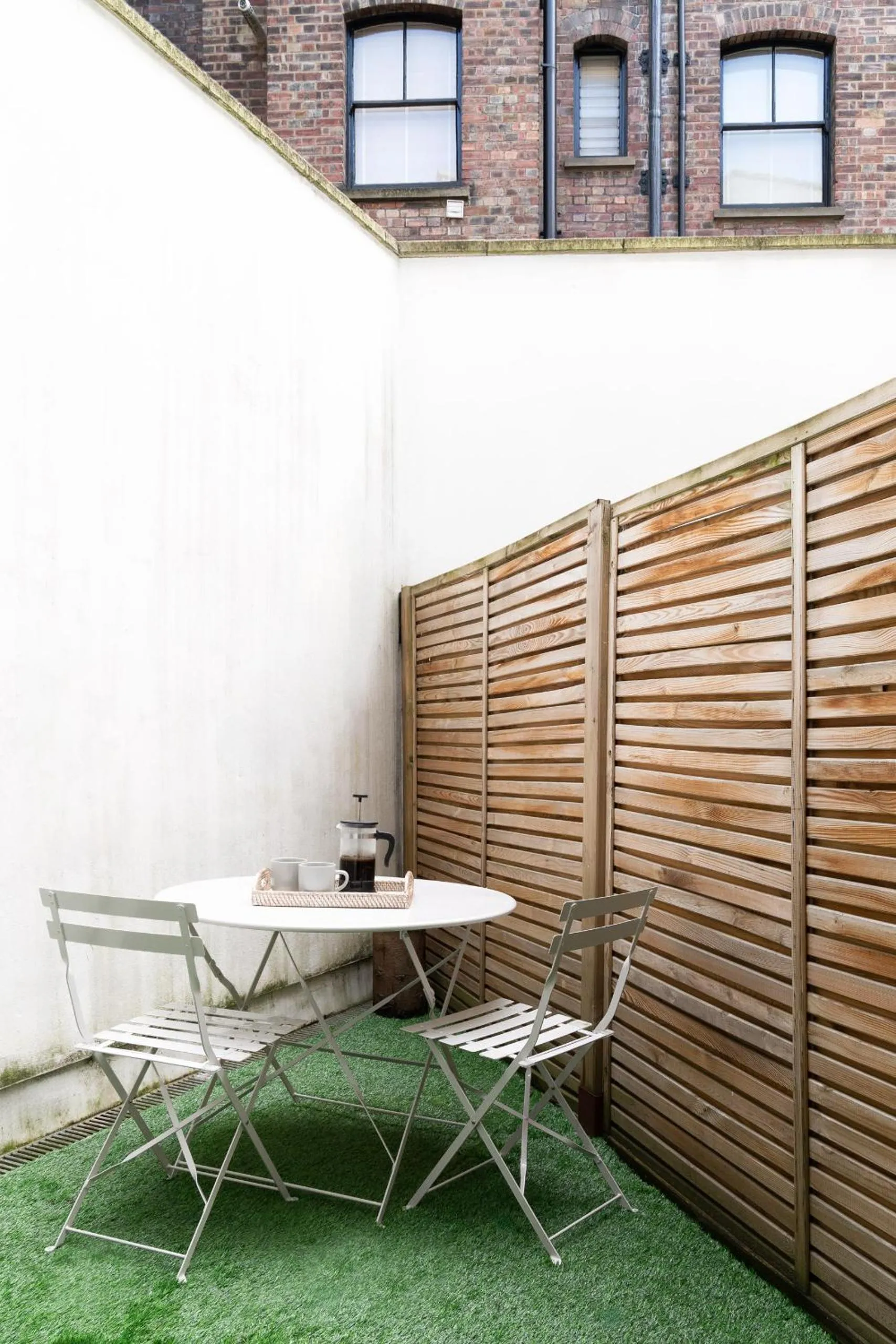 Patio in Oxford Circus Apartments by Calton Living