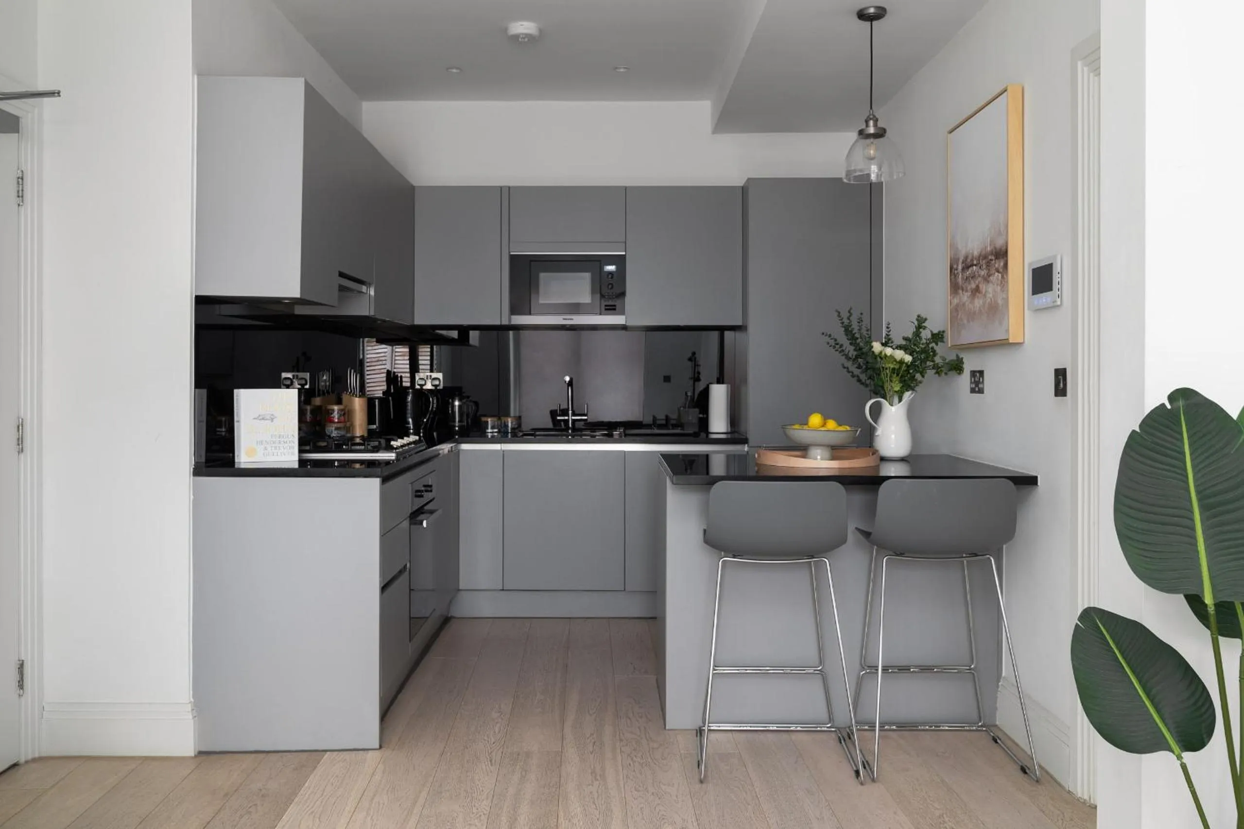 Kitchen or kitchenette in Oxford Circus Apartments by Calton Living