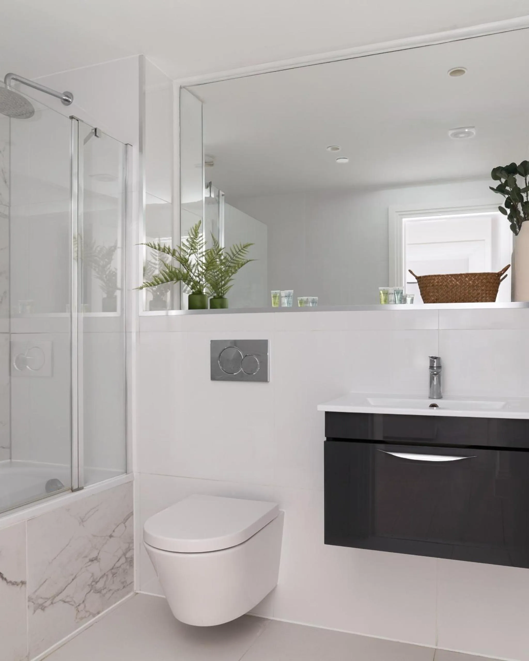 Bathroom in Oxford Circus Apartments by Calton Living