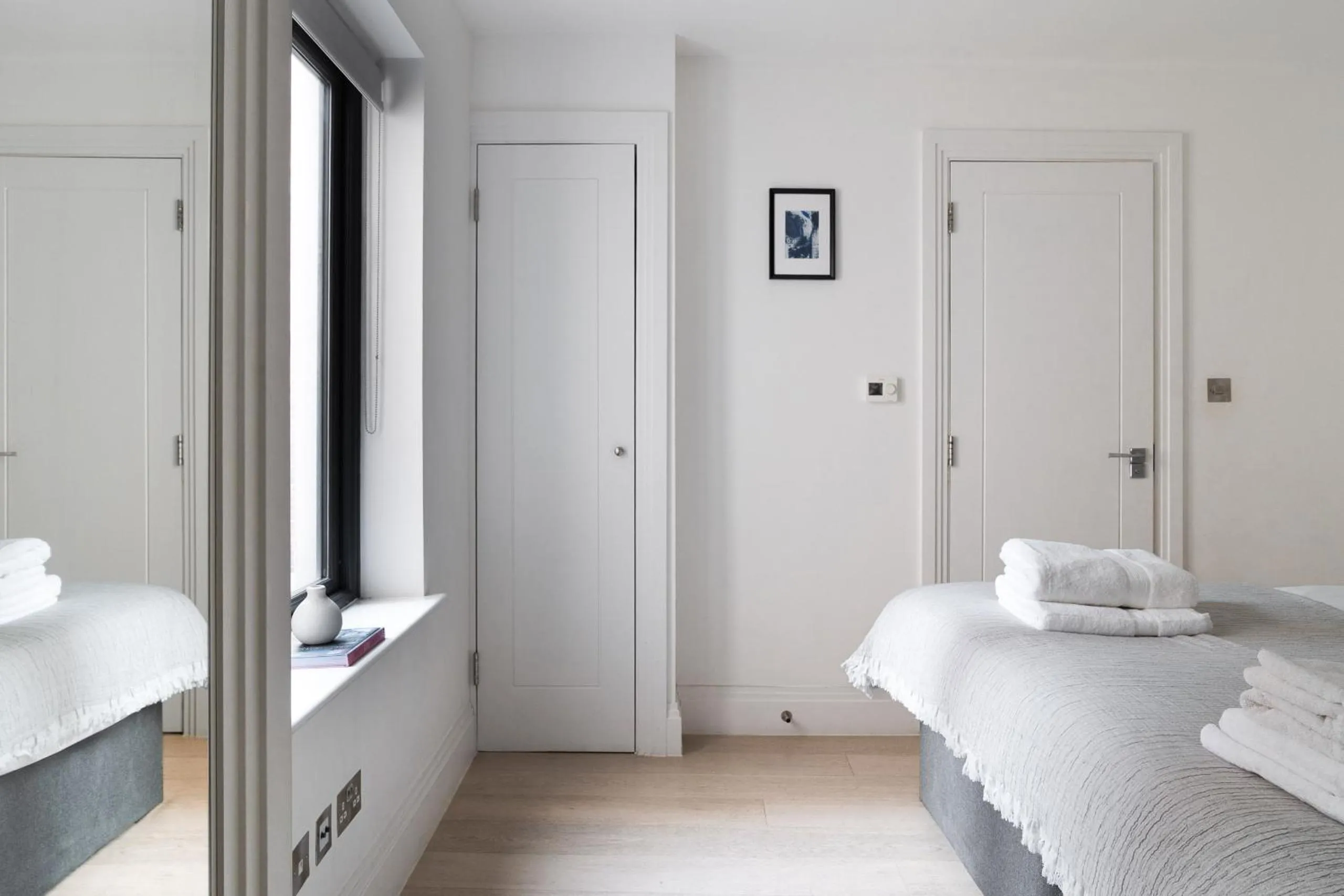 Bed in Oxford Circus Apartments by Calton Living