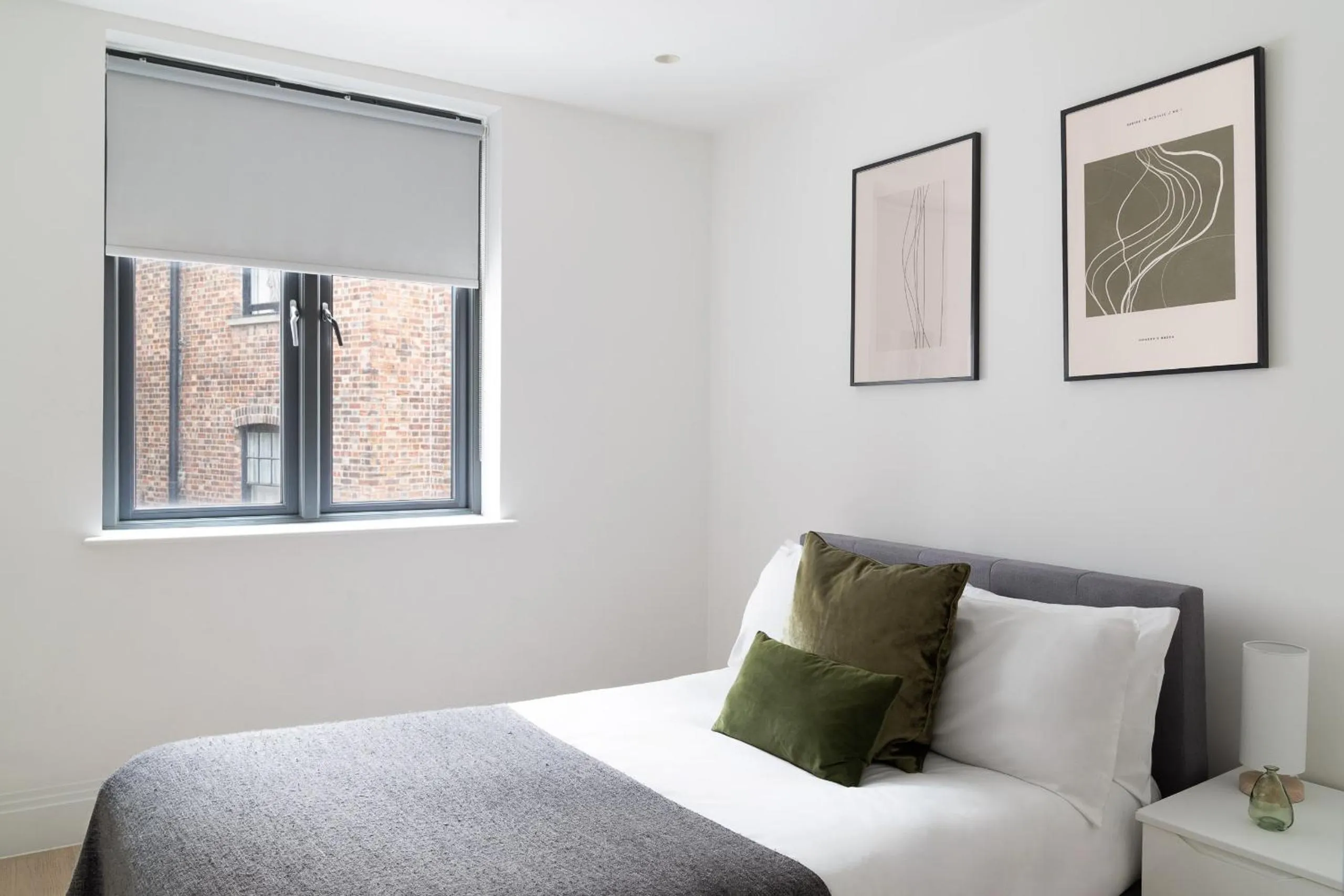 Bed in Oxford Circus Apartments by Calton Living