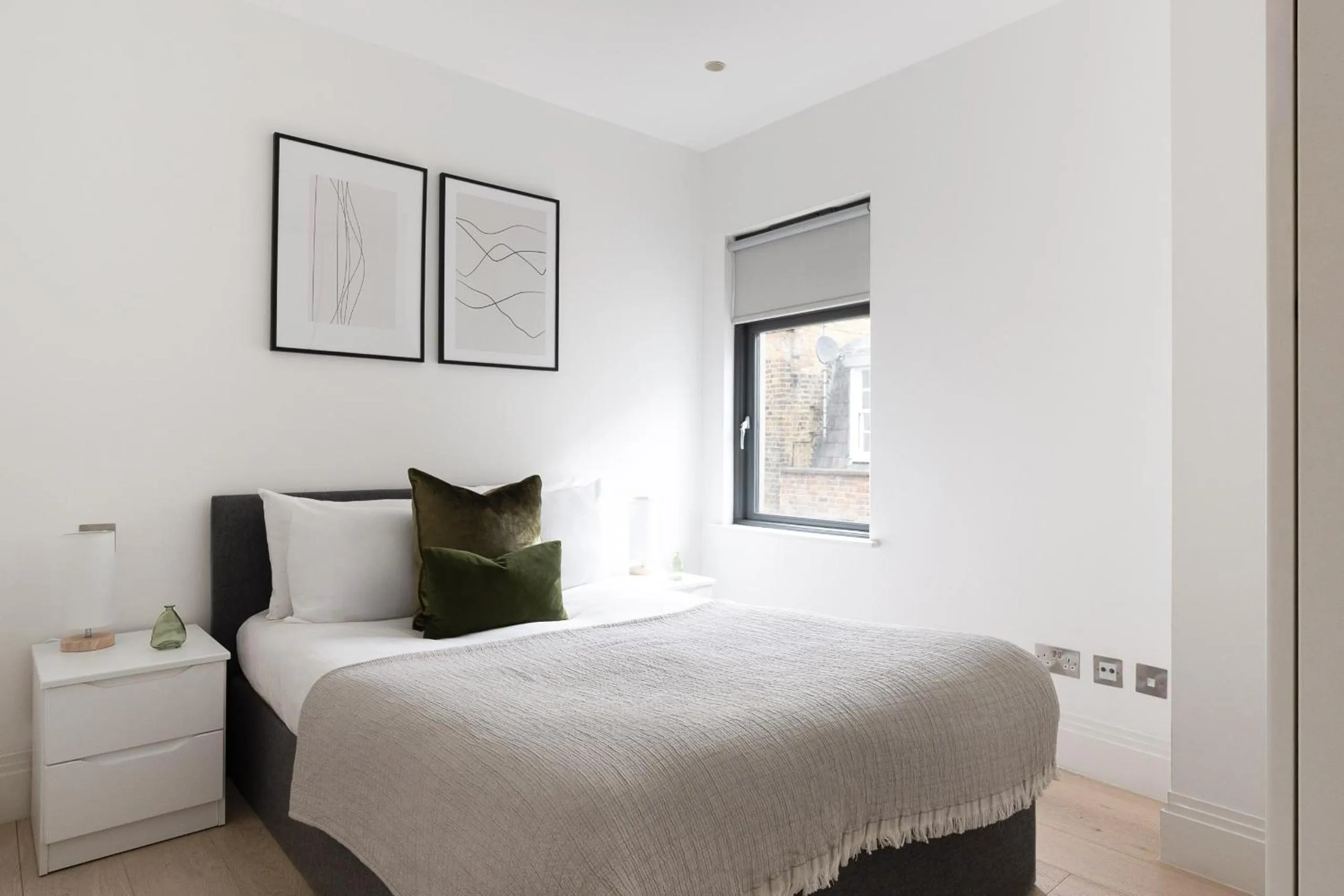 Bed in Oxford Circus Apartments by Calton Living
