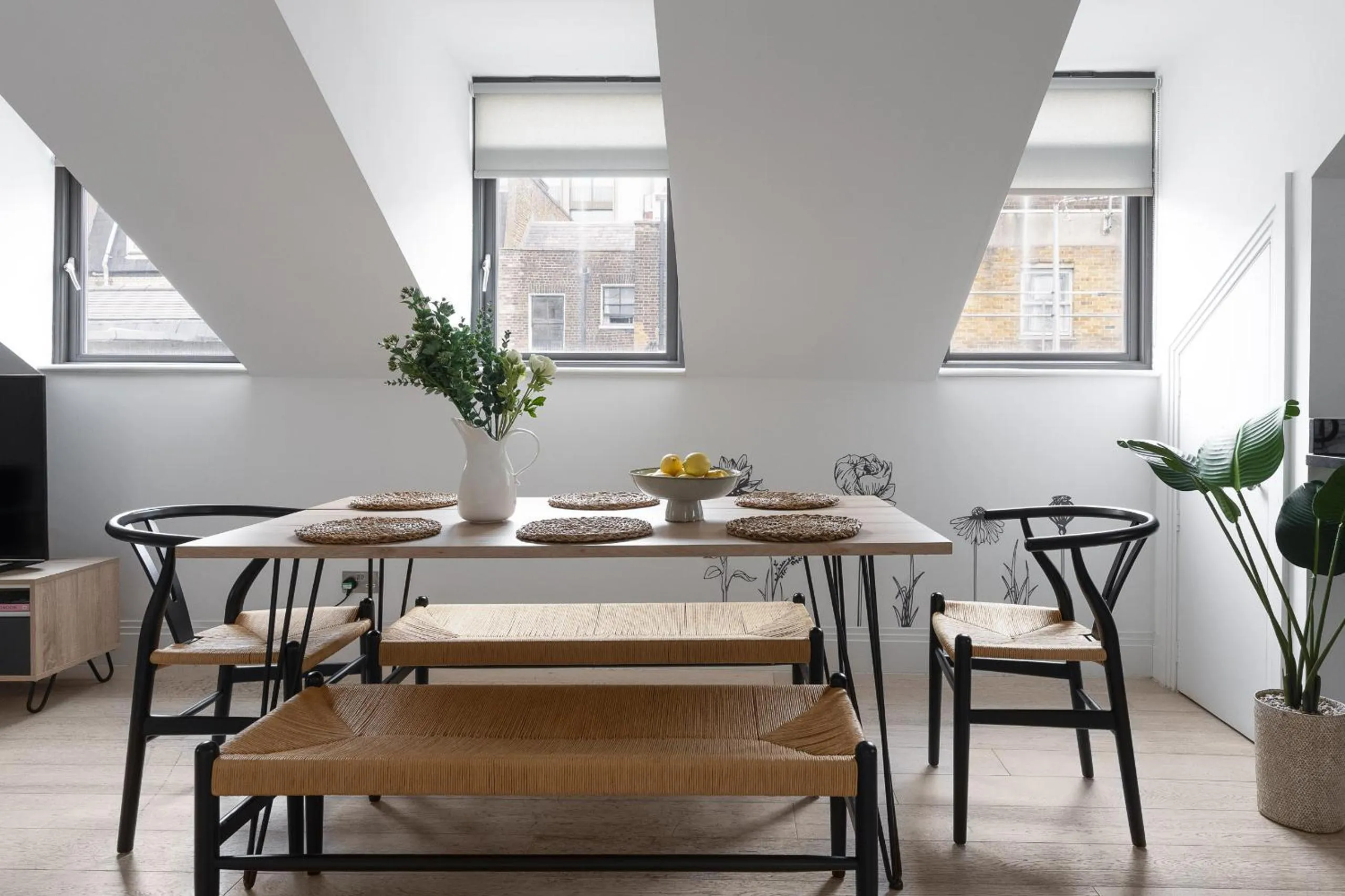 Dining area in Oxford Circus Apartments by Calton Living