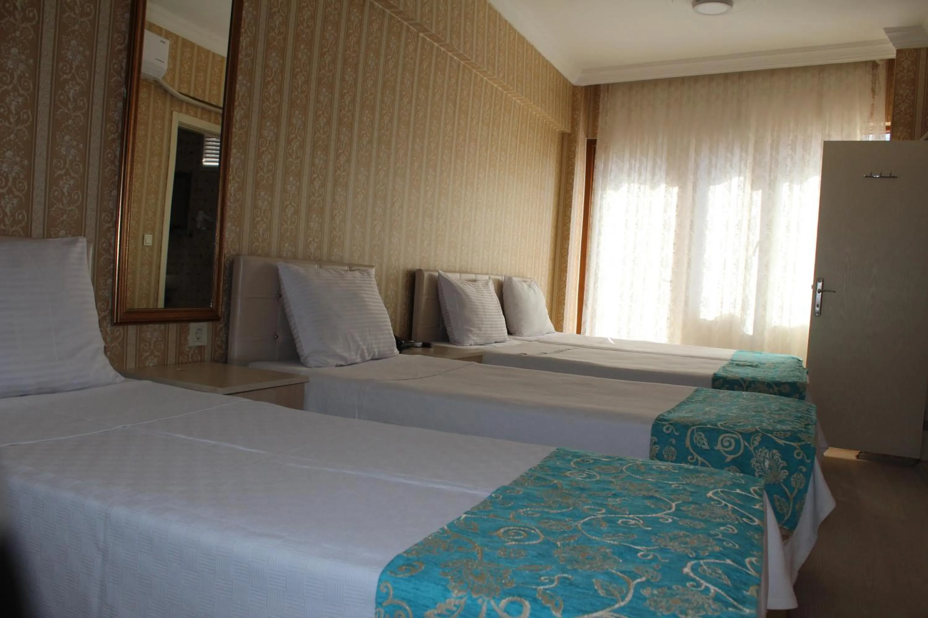 Photo of the whole room, Bed in Omega Inn