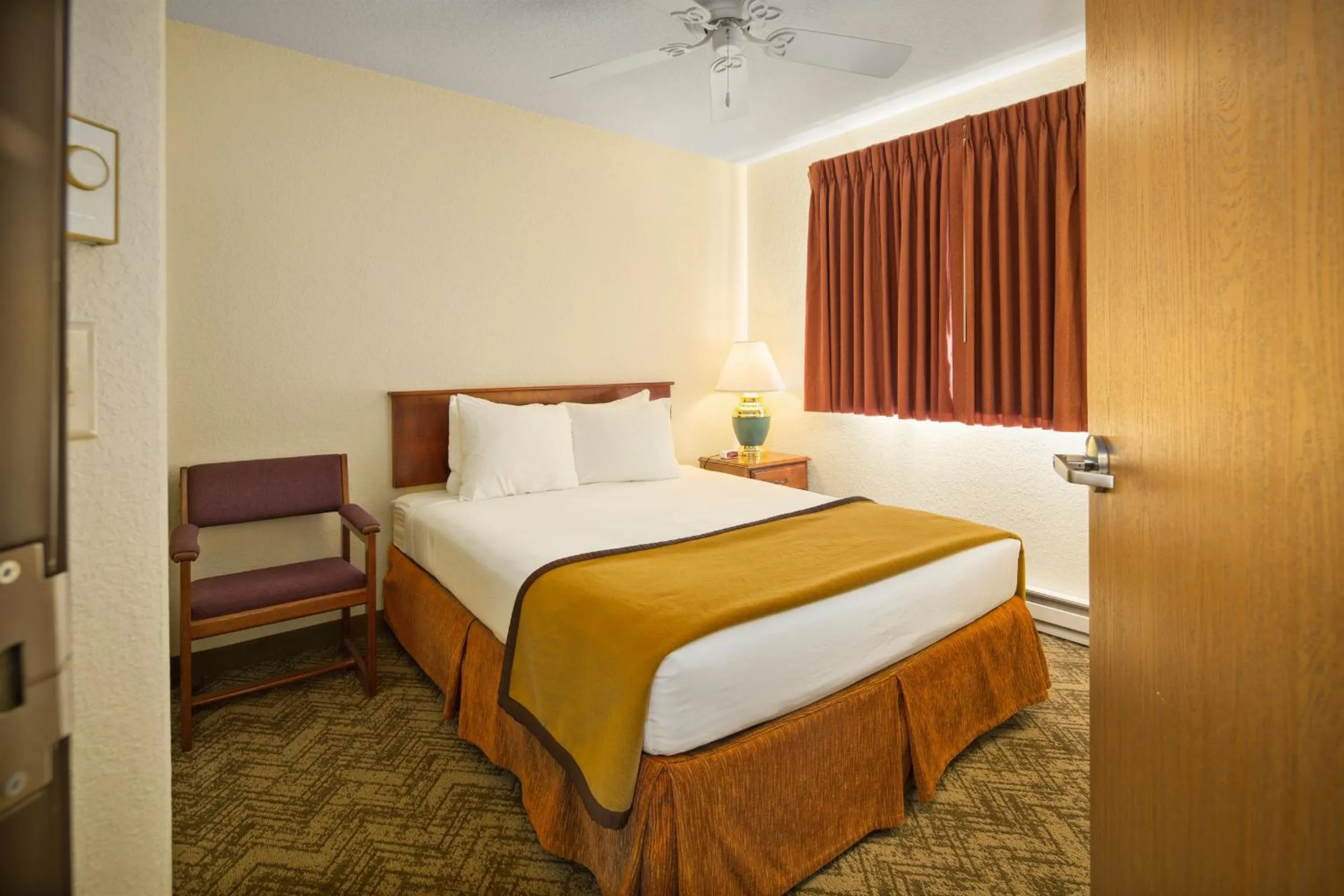 Bed in Black Hills Luxury Suites