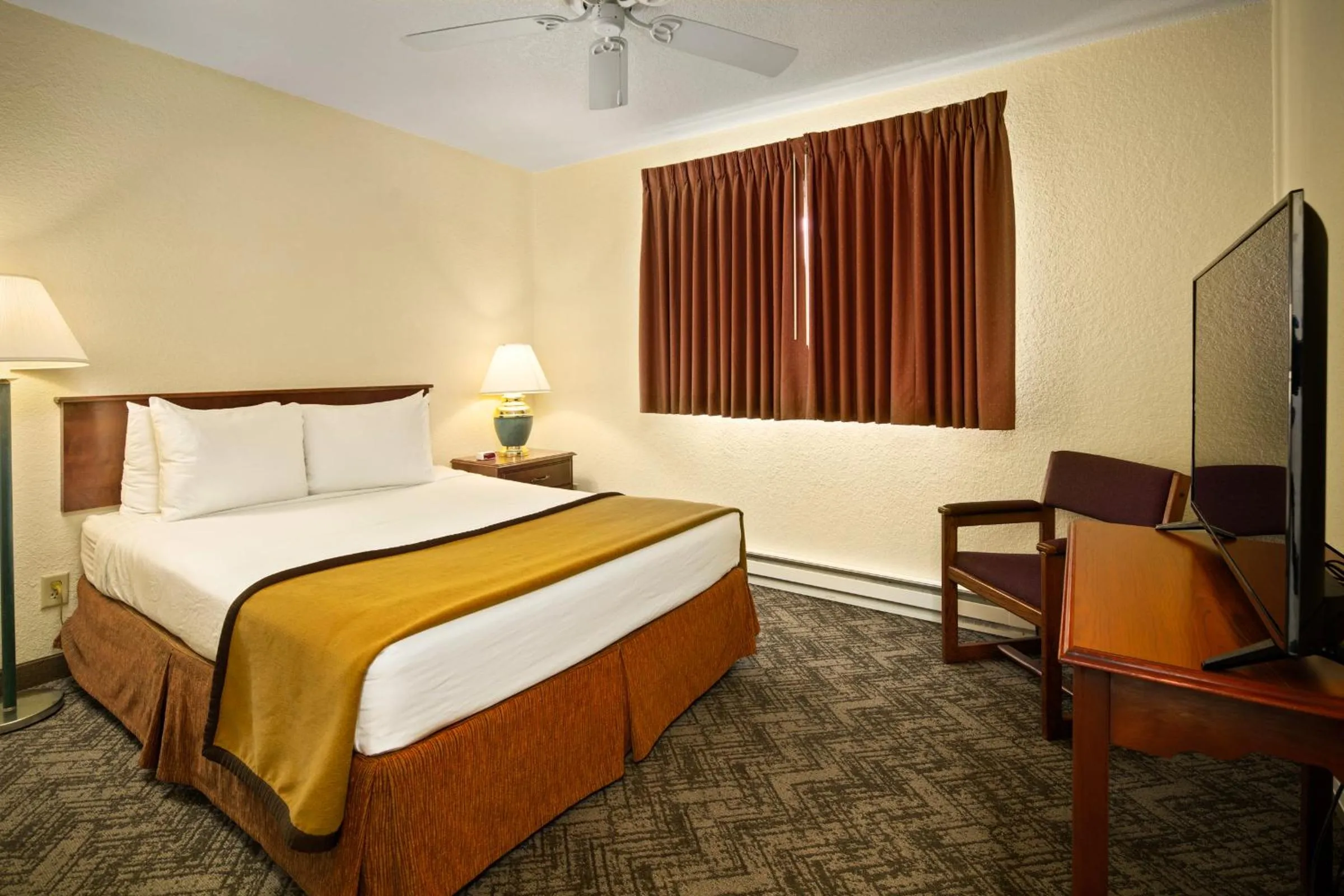 Bed in Black Hills Luxury Suites