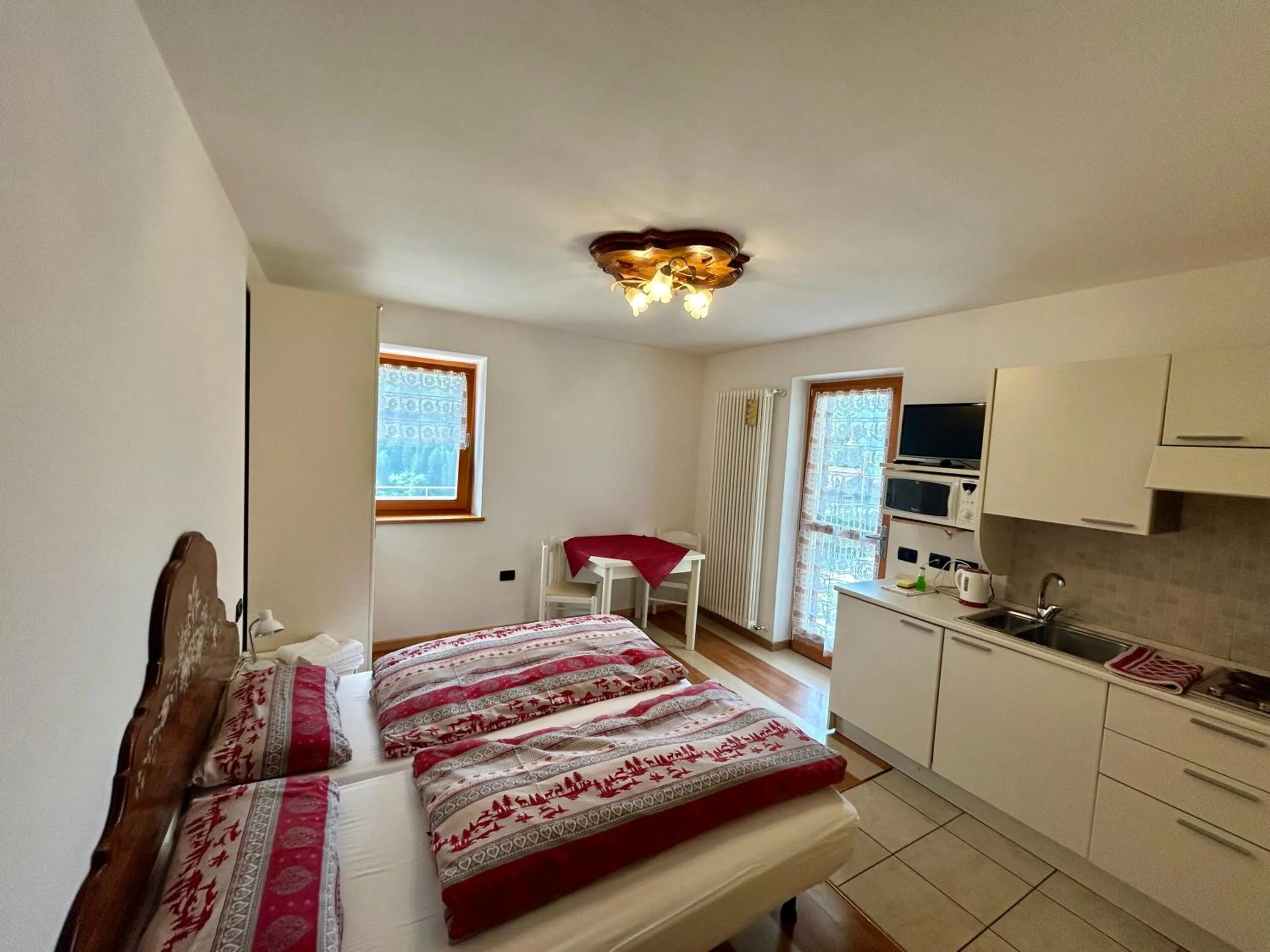 Photo of the whole room, Bed in Residence Al Pescatore