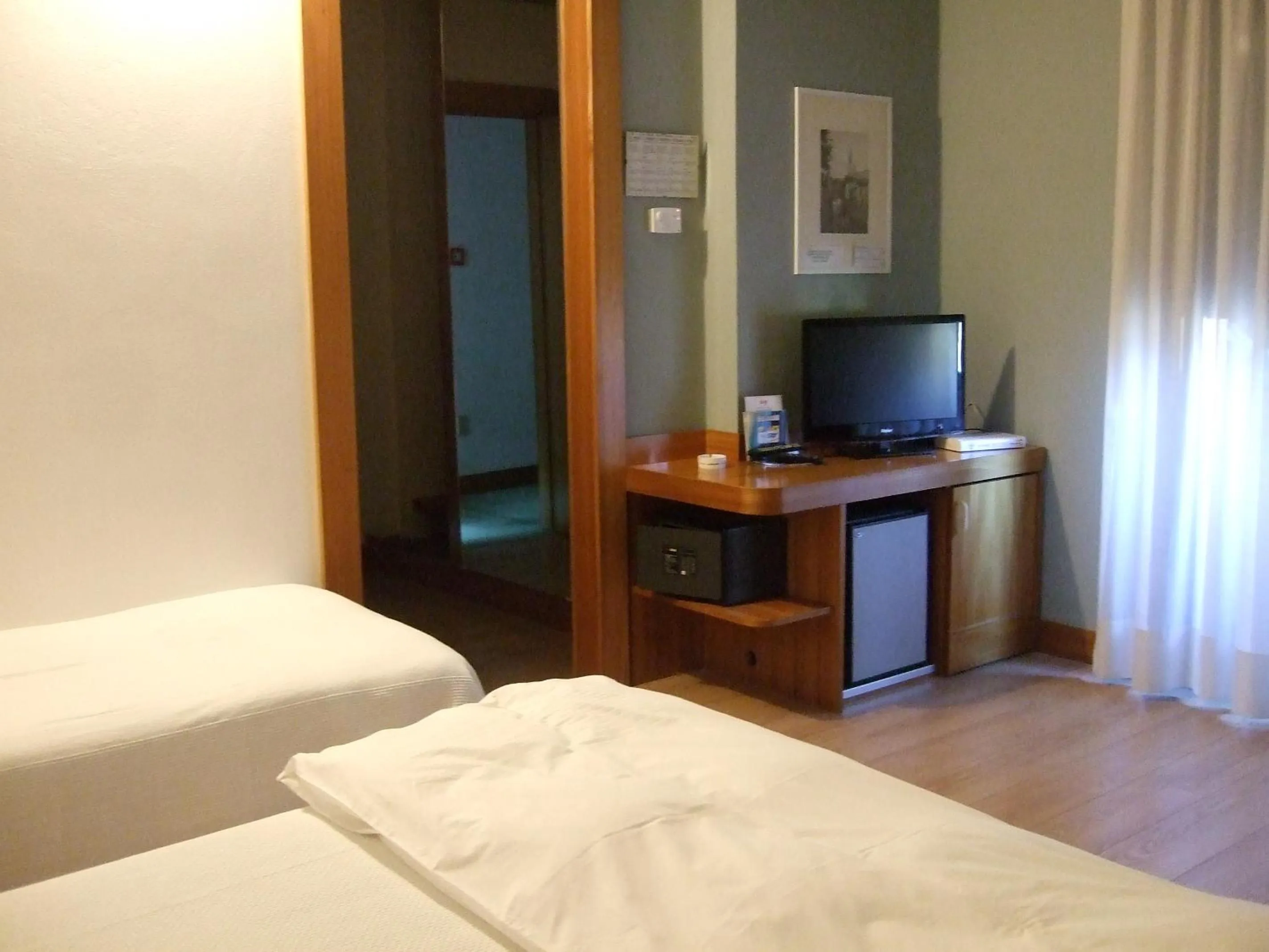 Bed in Hotel Canturio