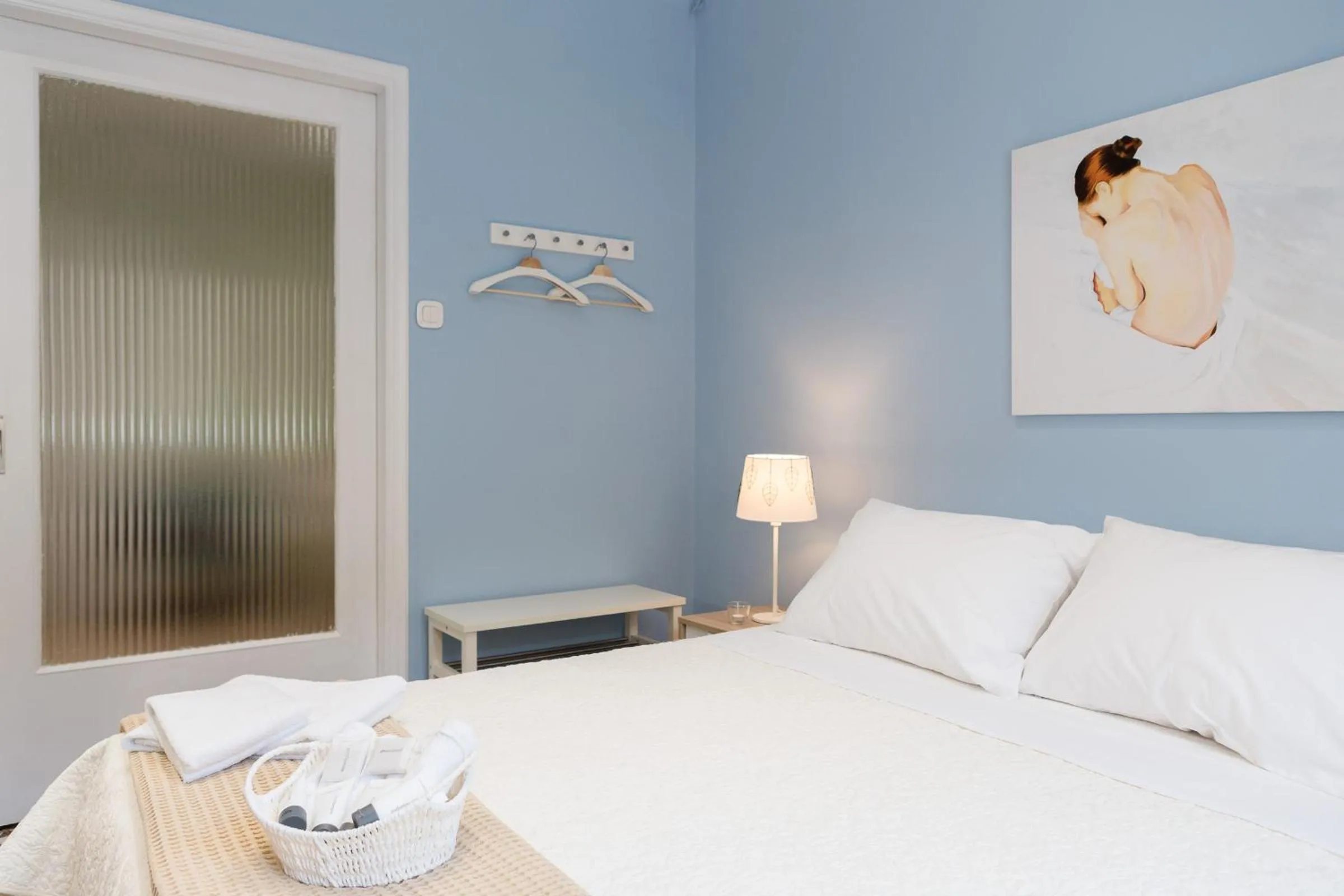 Bed in Grandma's Chic & Bright Athenian home with a Patio