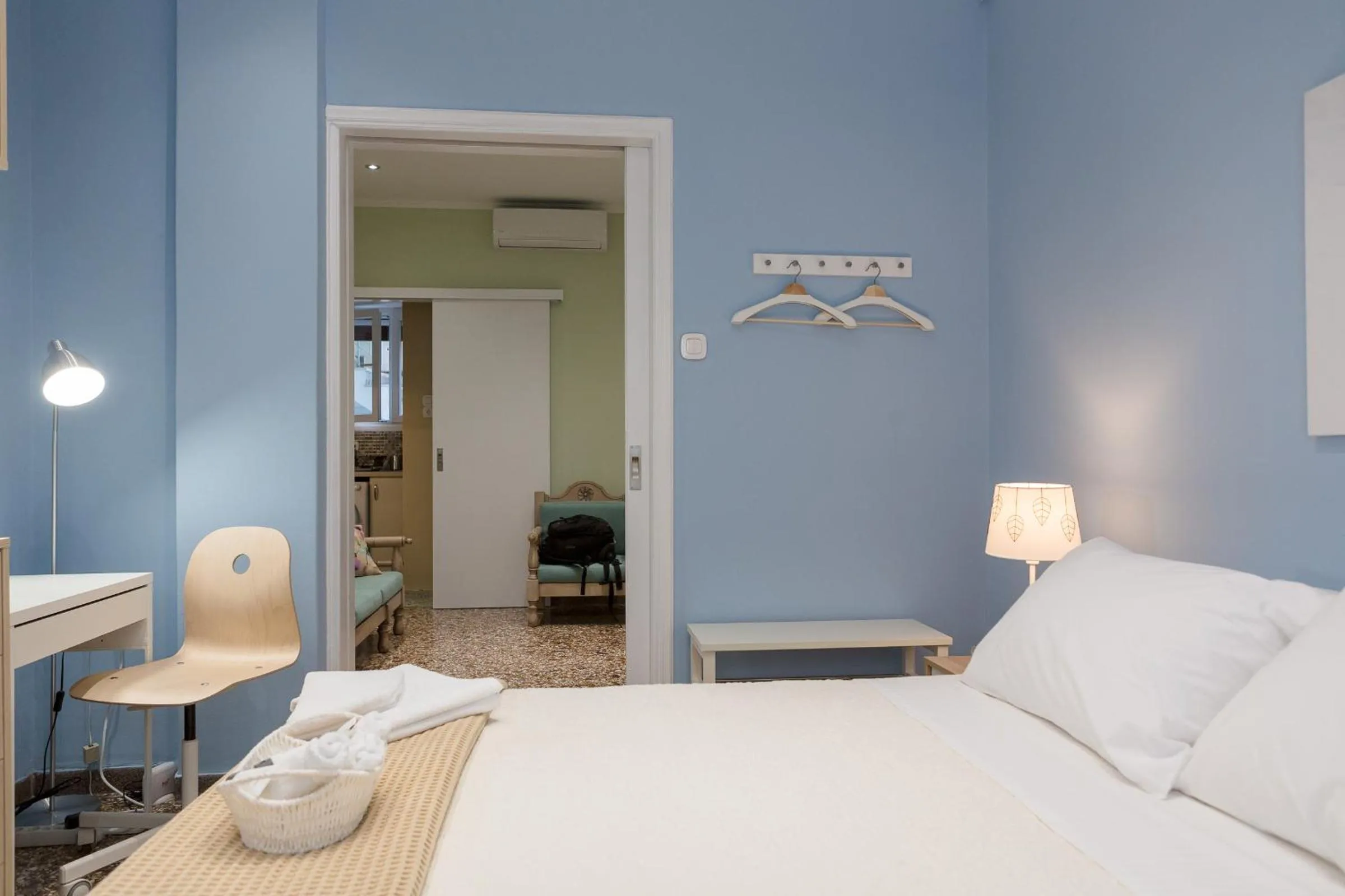 Bed in Grandma's Chic & Bright Athenian home with a Patio