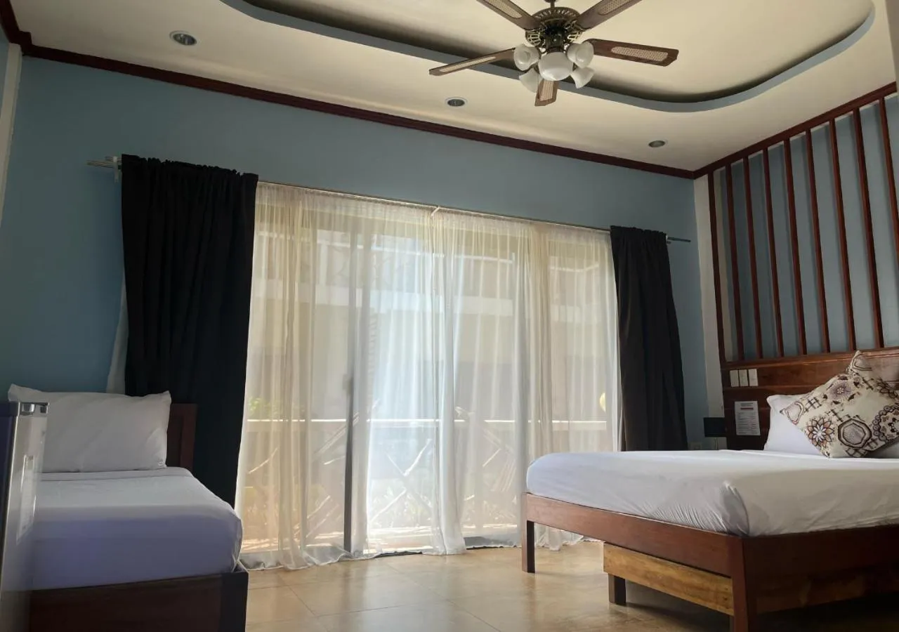 Bed in Hotel Oasis Port Barton