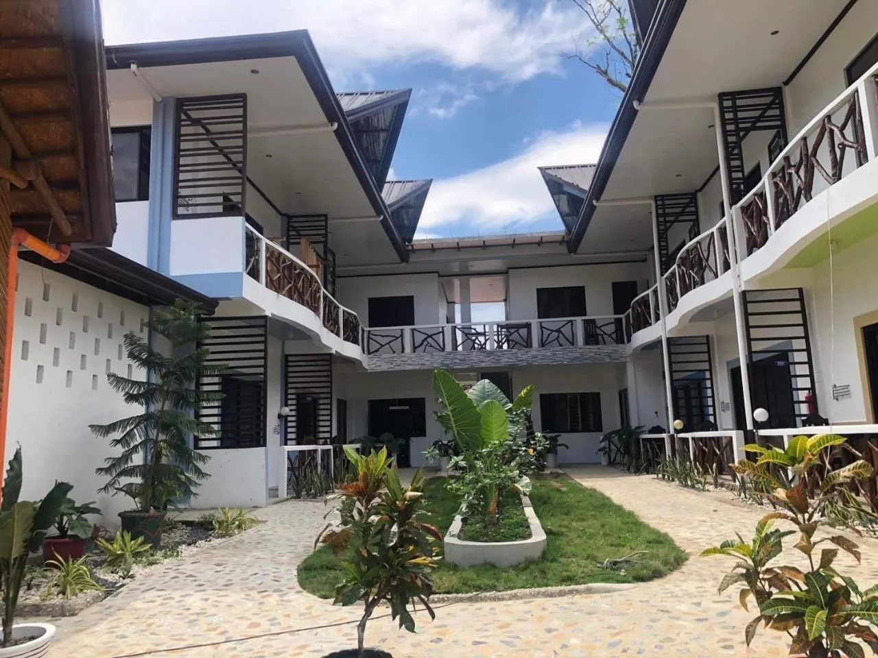 Property building in Hotel Oasis Port Barton