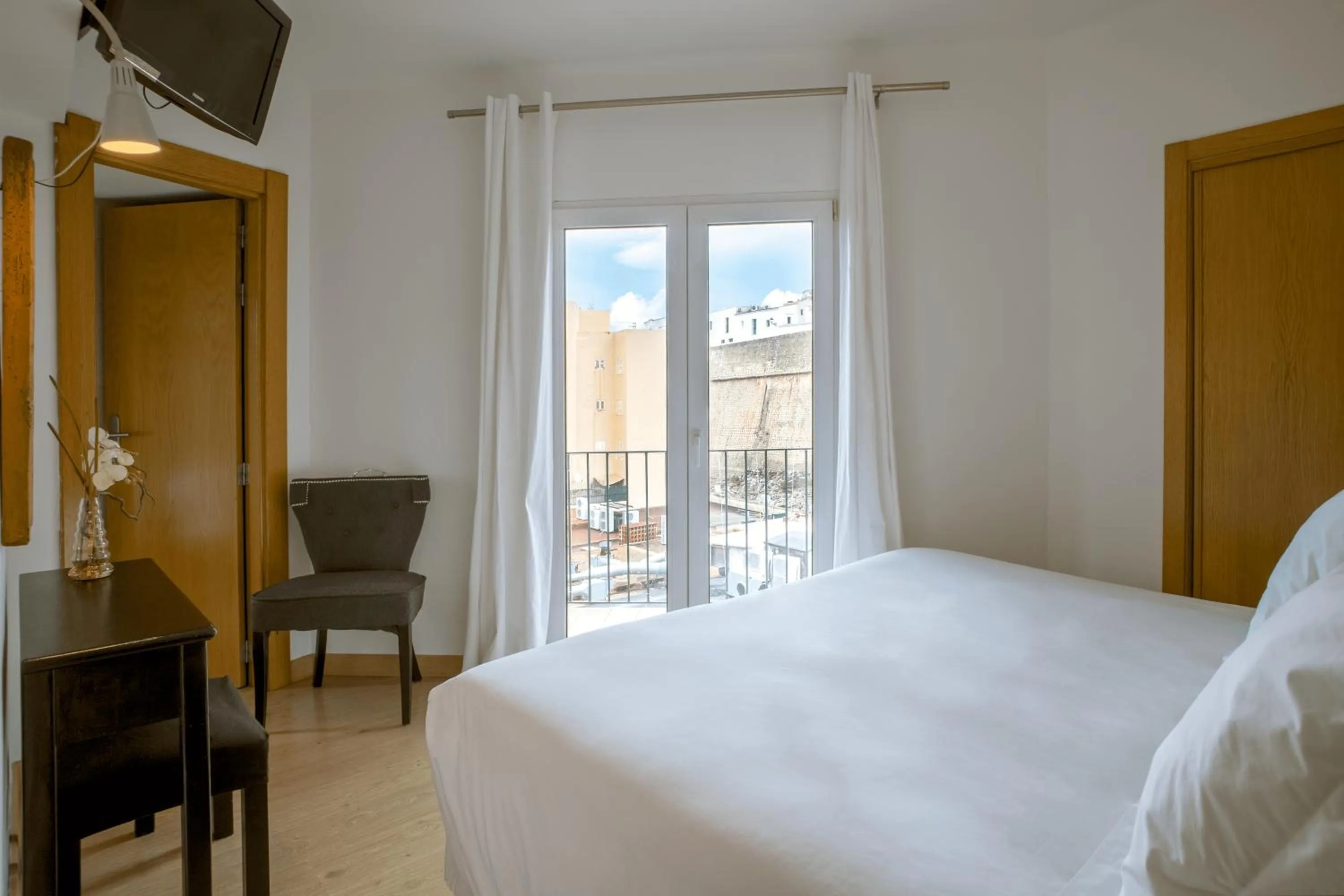 Photo of the whole room, Bed in Hostal Parque Ibiza