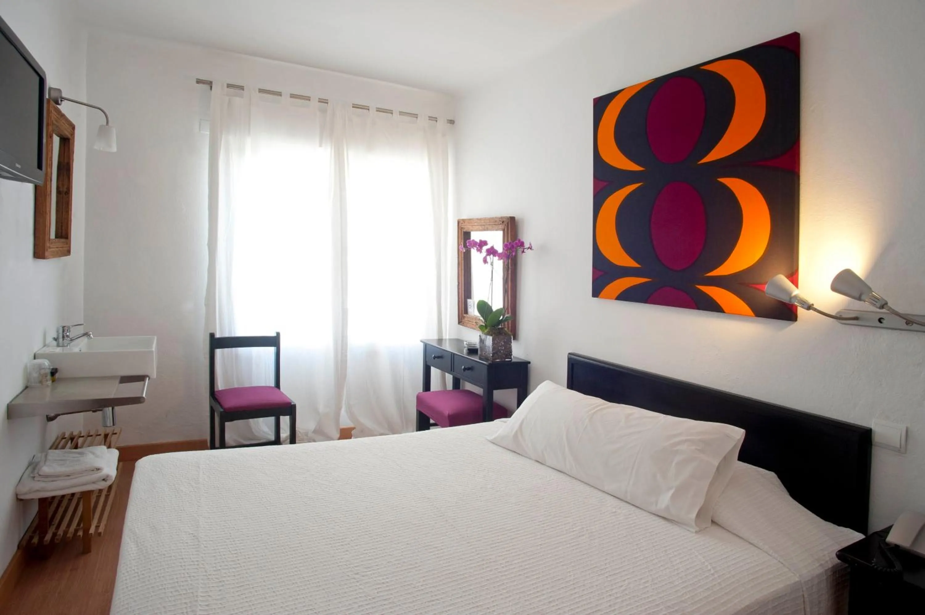 Photo of the whole room, Bed in Hostal Parque Ibiza