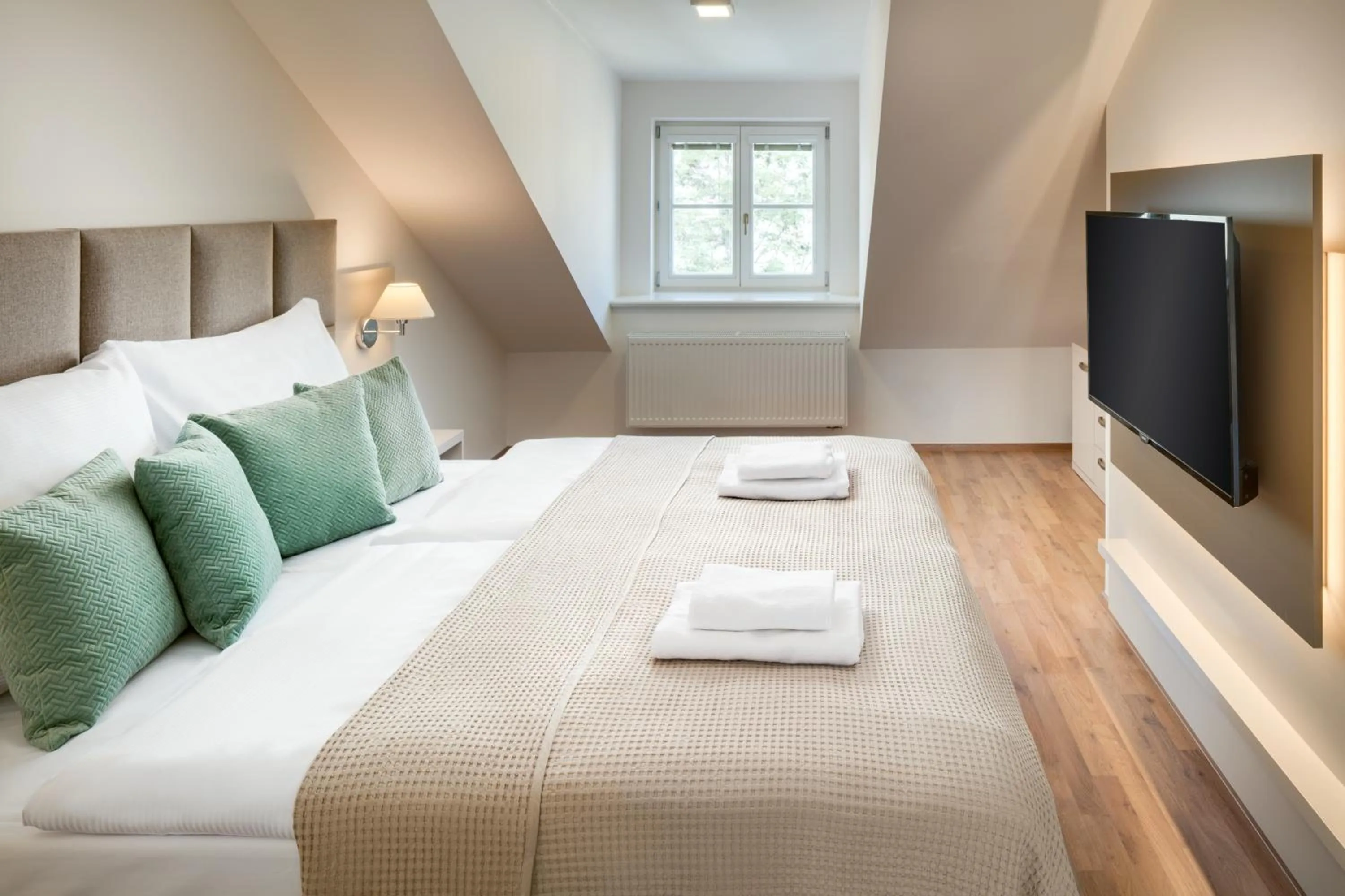 Bed in Louren Apartments