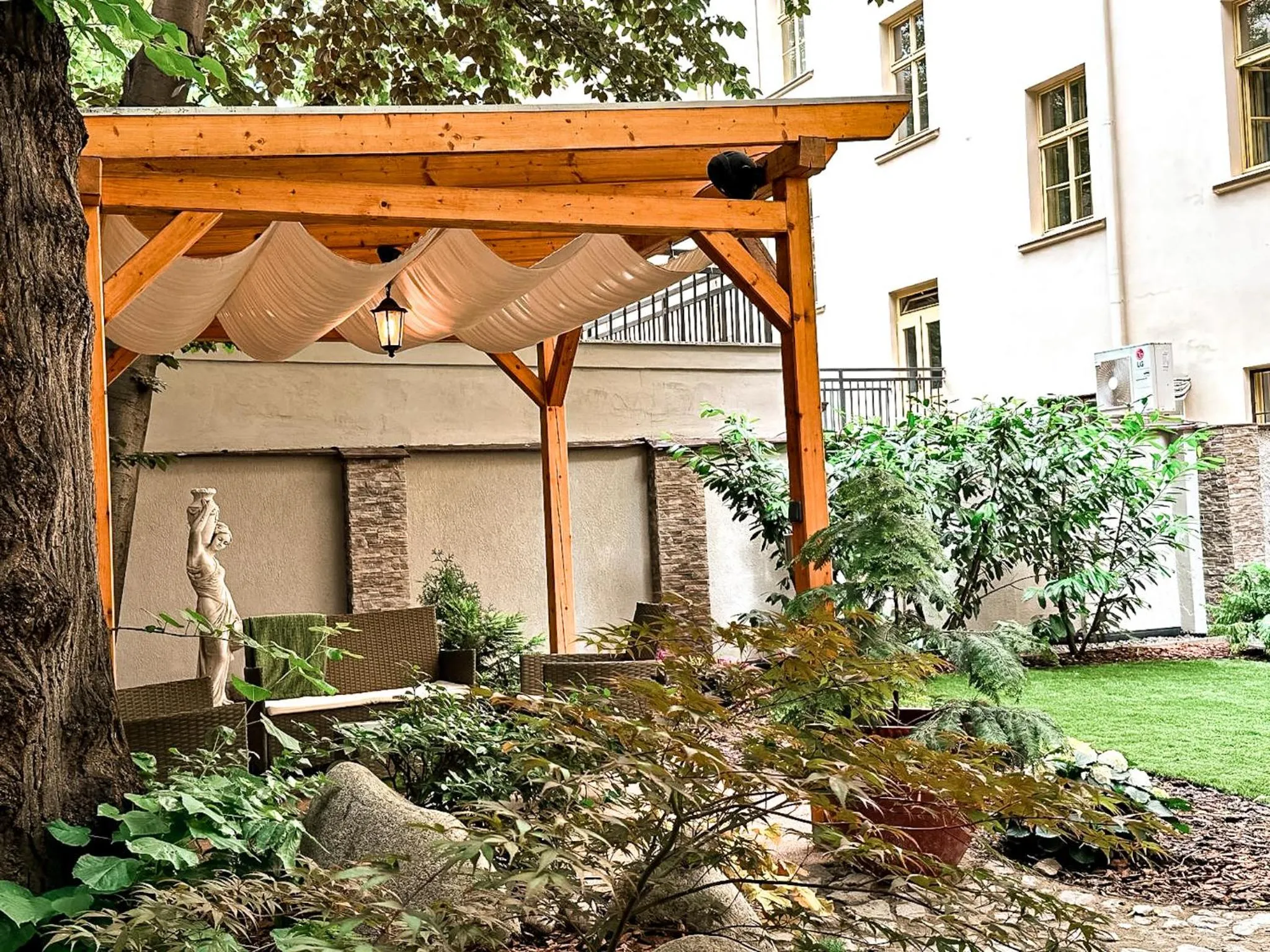 Garden in Alfons Boutique Hotel