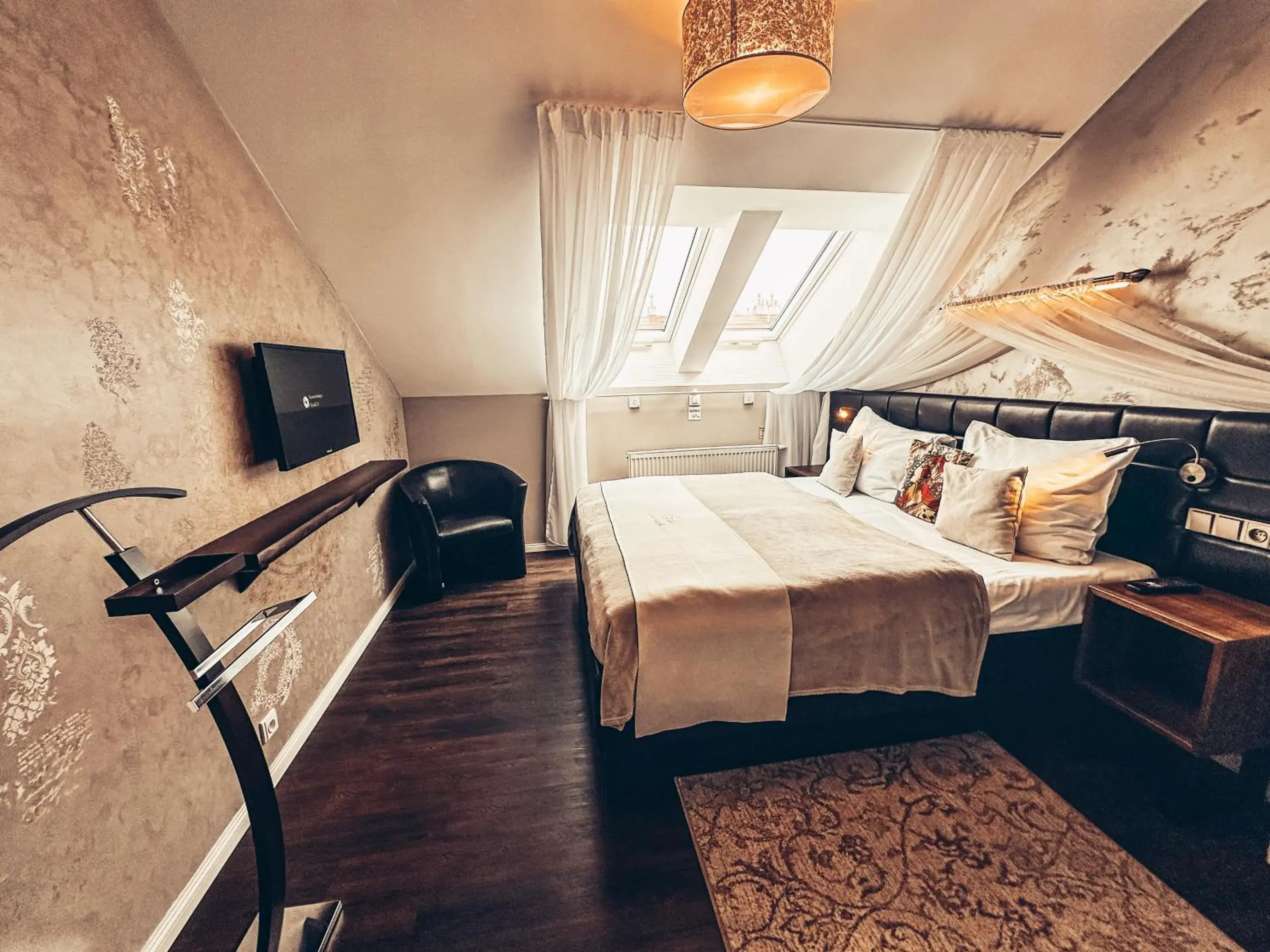 Communal lounge/ TV room, Bed in Alfons Boutique Hotel Communal lounge/ TV room, Bed in Alfons Boutique Hotel