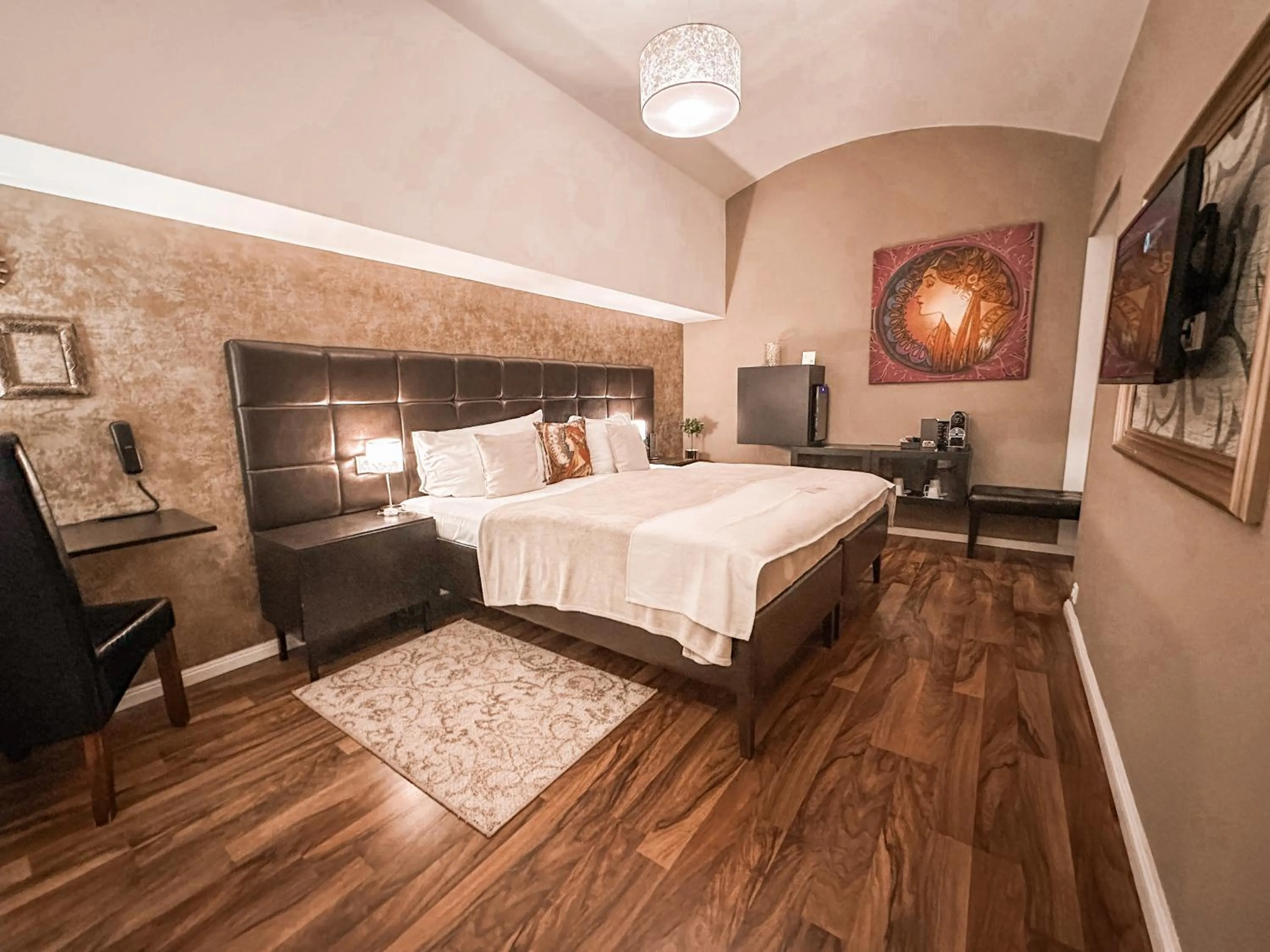 Bed in Alfons Boutique Hotel