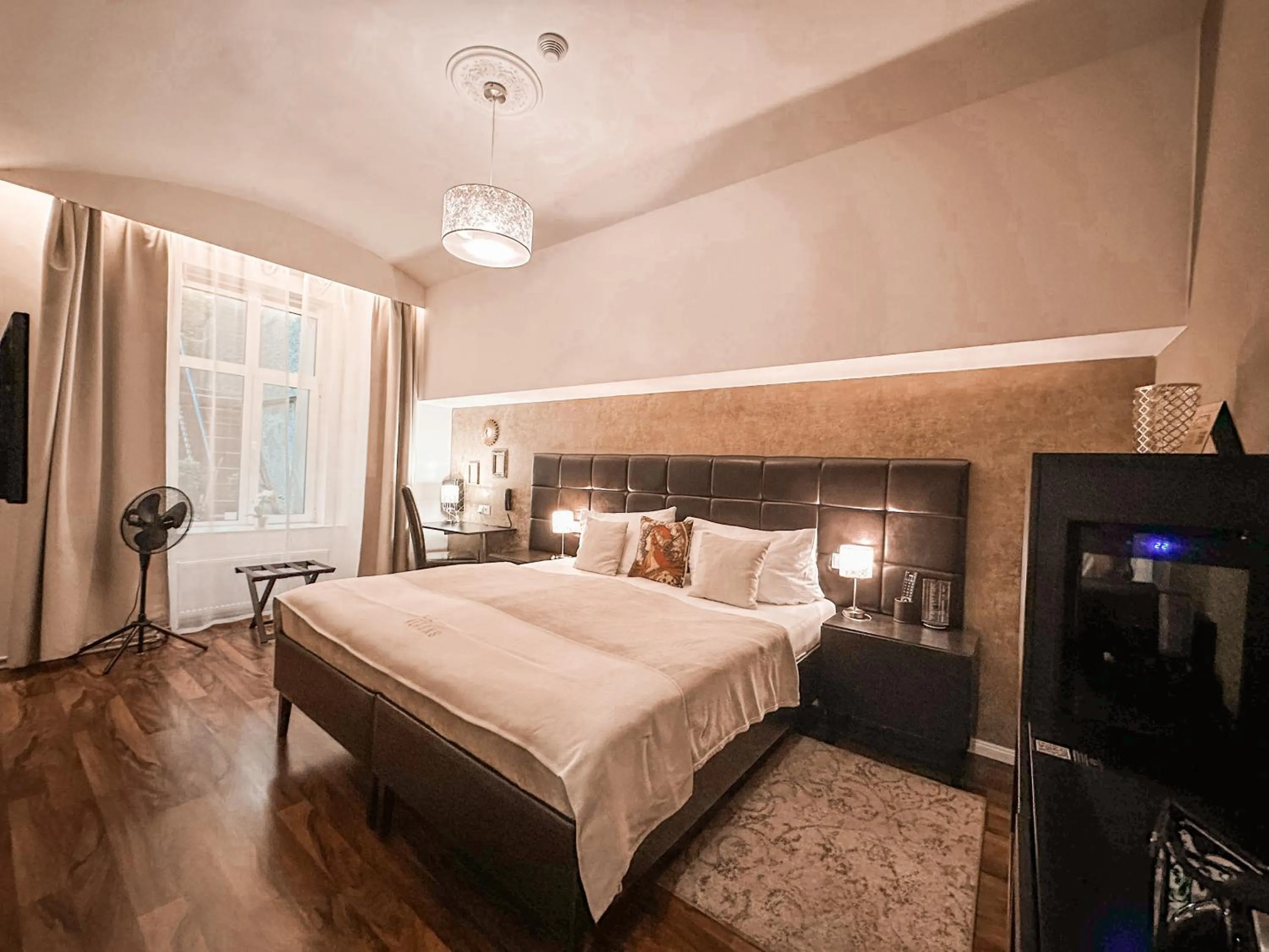 Bed in Alfons Boutique Hotel