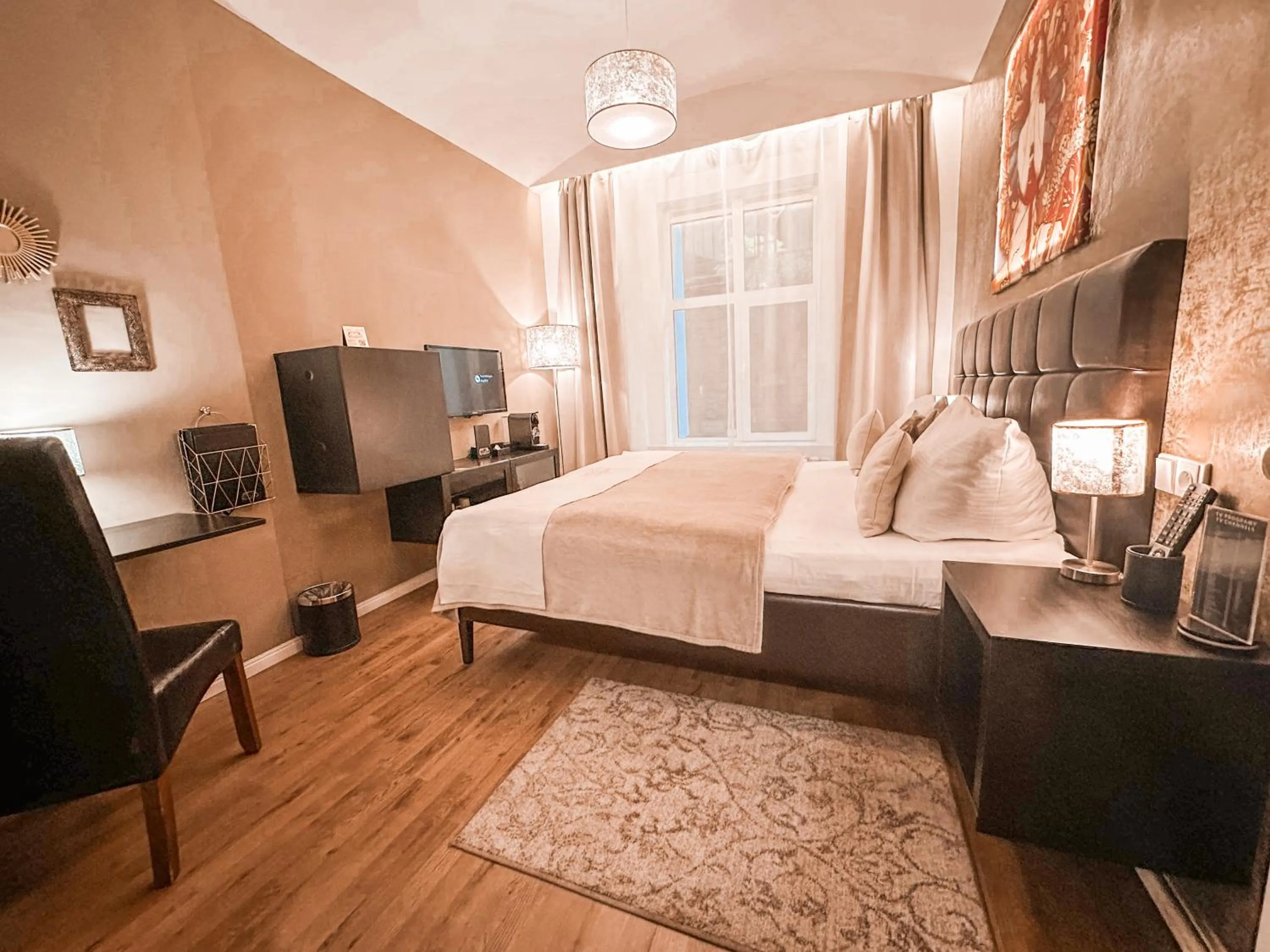 Bed in Alfons Boutique Hotel