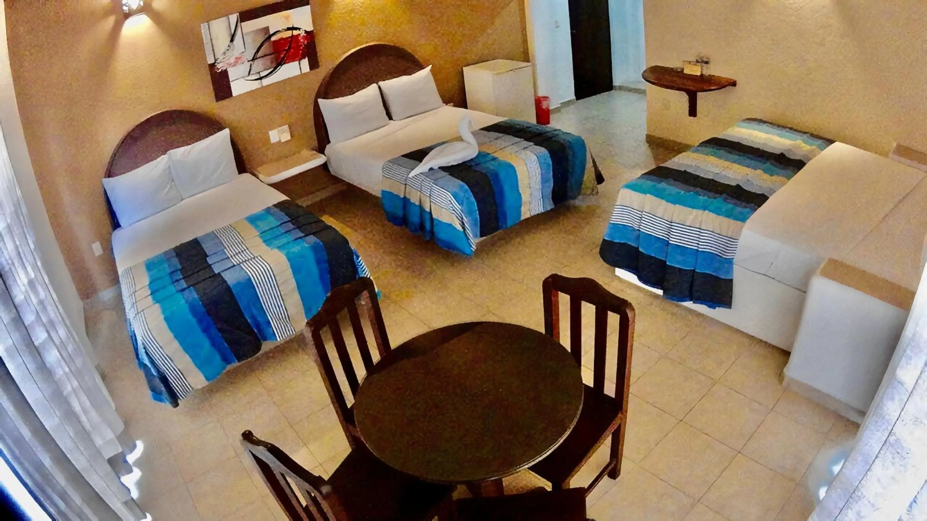 Bed in Hotel Bahia Huatulco